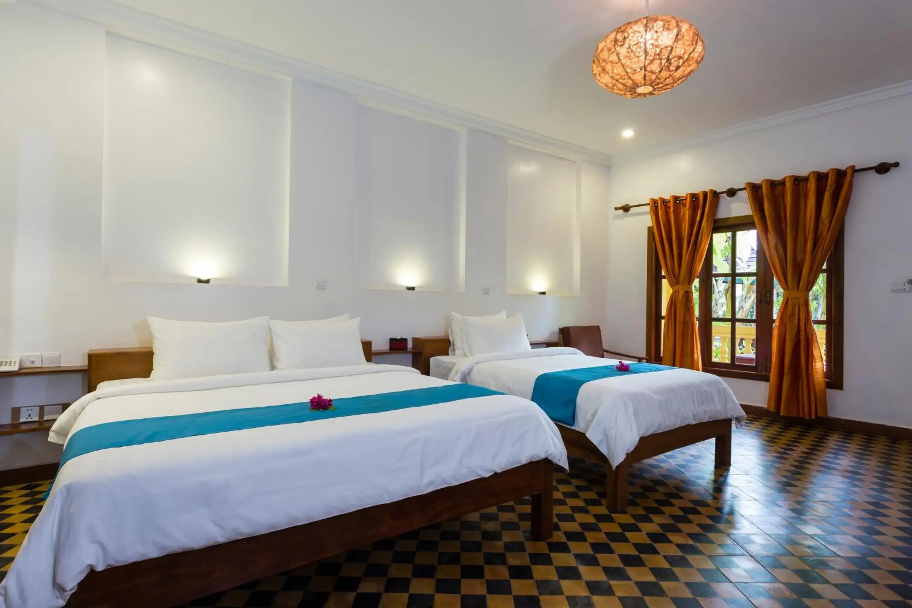 Triple Room in Le Jardin d'Angkor Hotel & Resort Triple Room in Le Jardin d'Angkor Hotel & Resort