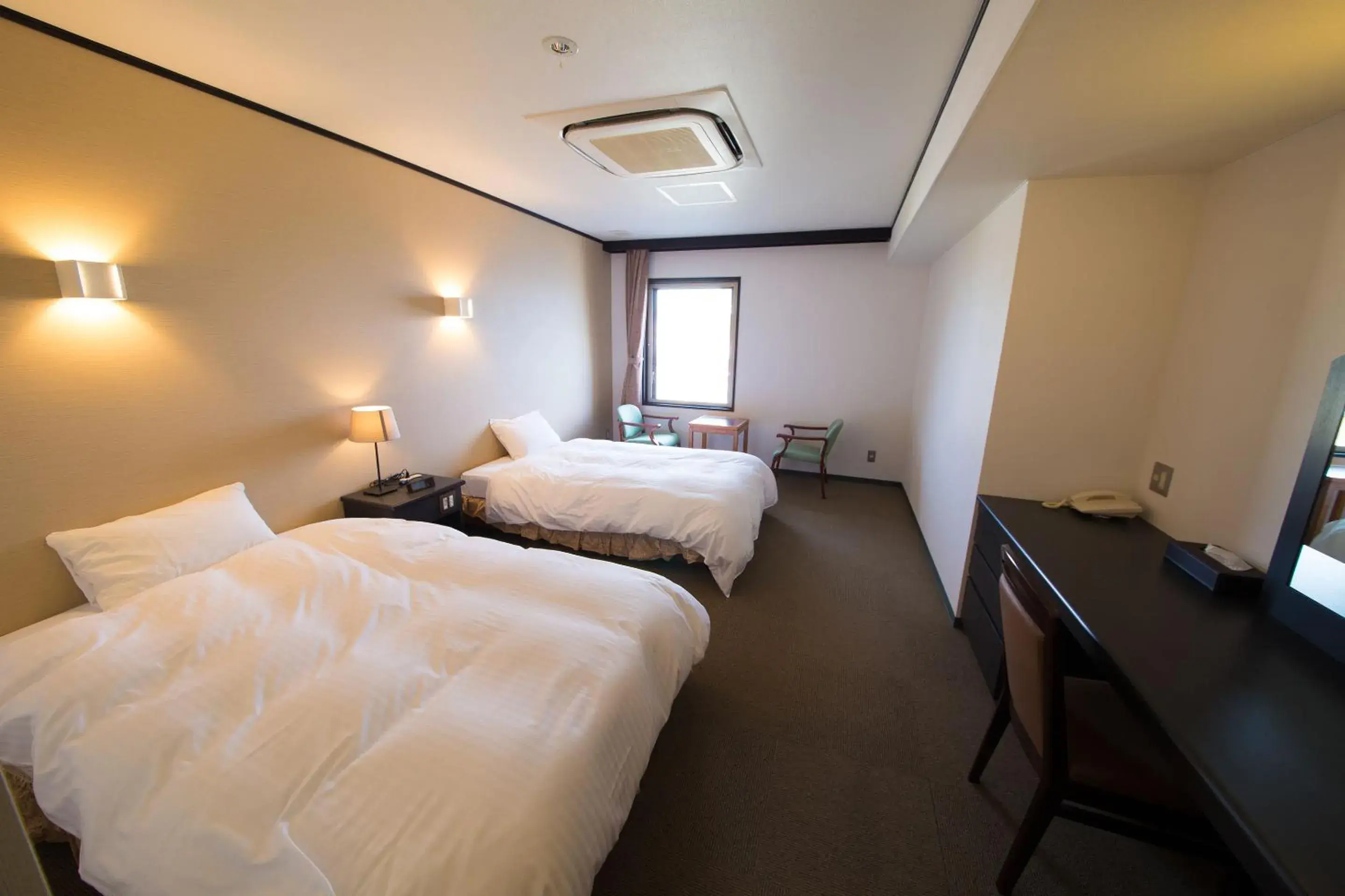 Standard Twin Room with Mountain View in Seaside Hotel Taimaru Kaigetsu Standard Twin Room with Mountain View in Seaside Hotel Taimaru Kaigetsu
