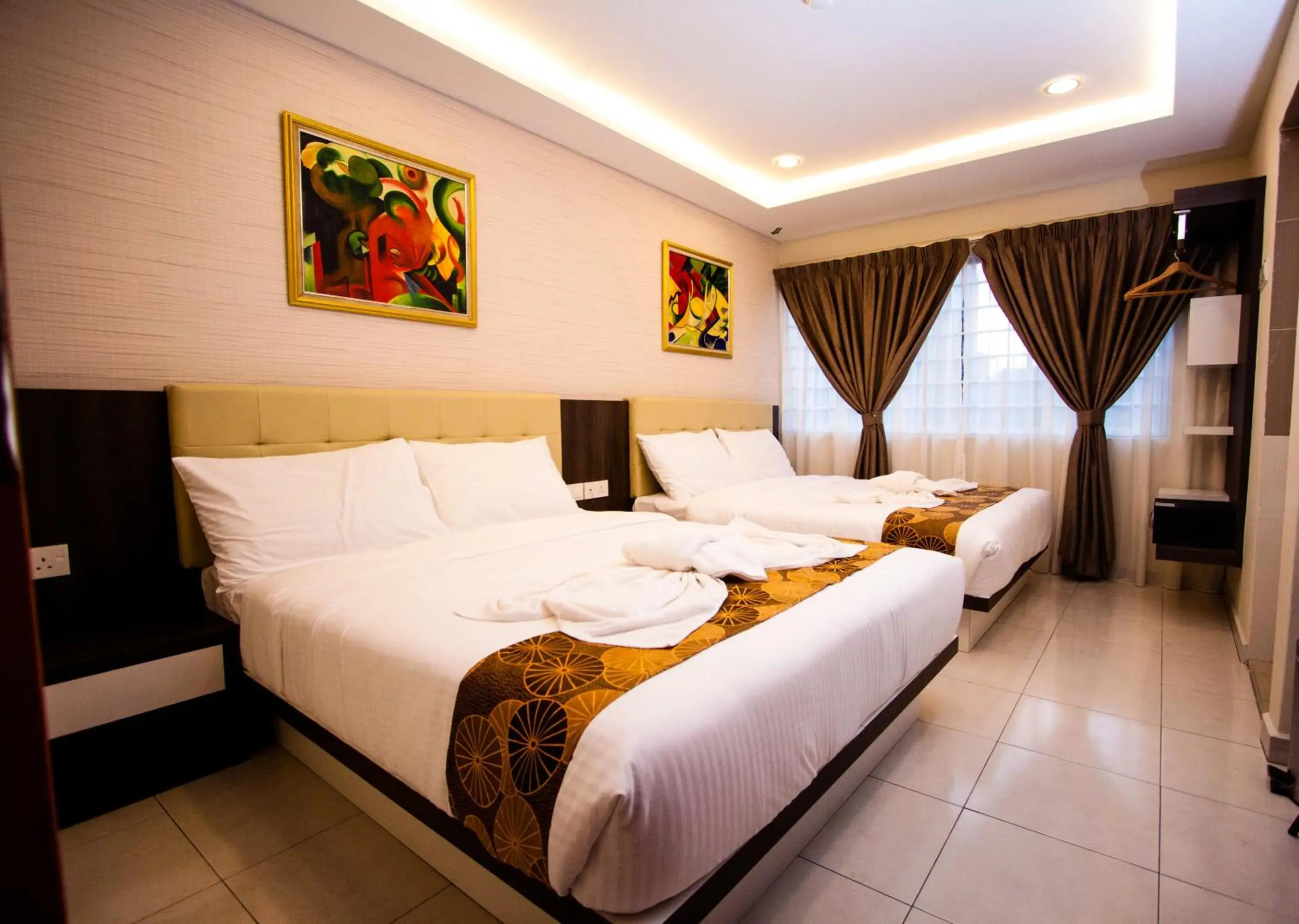 Deluxe Quadruple Room in Louis Hotel Deluxe Quadruple Room in Louis Hotel