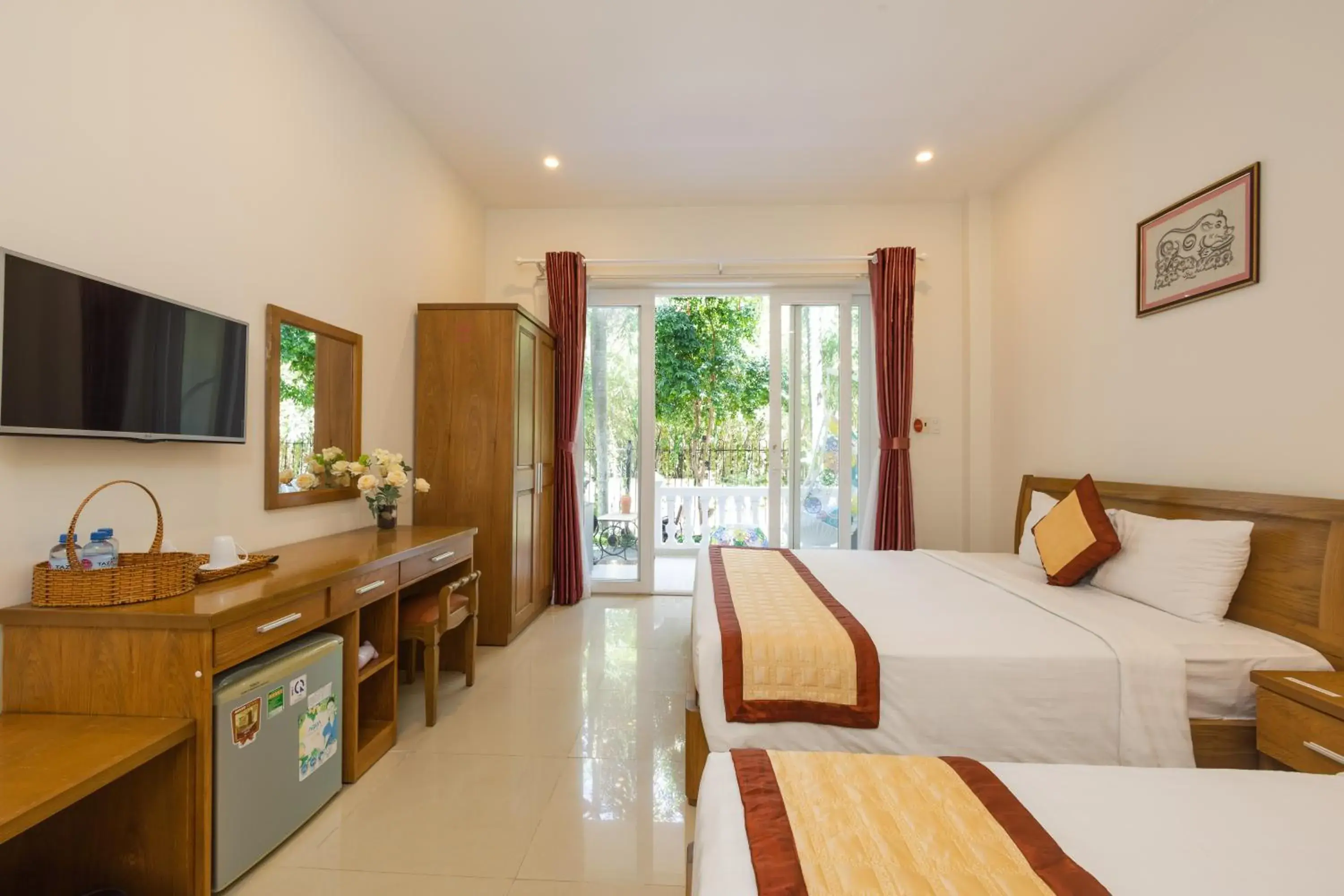 Deluxe Triple Room in T&T Resort and Spa Phu Quoc Deluxe Triple Room in T&T Resort and Spa Phu Quoc