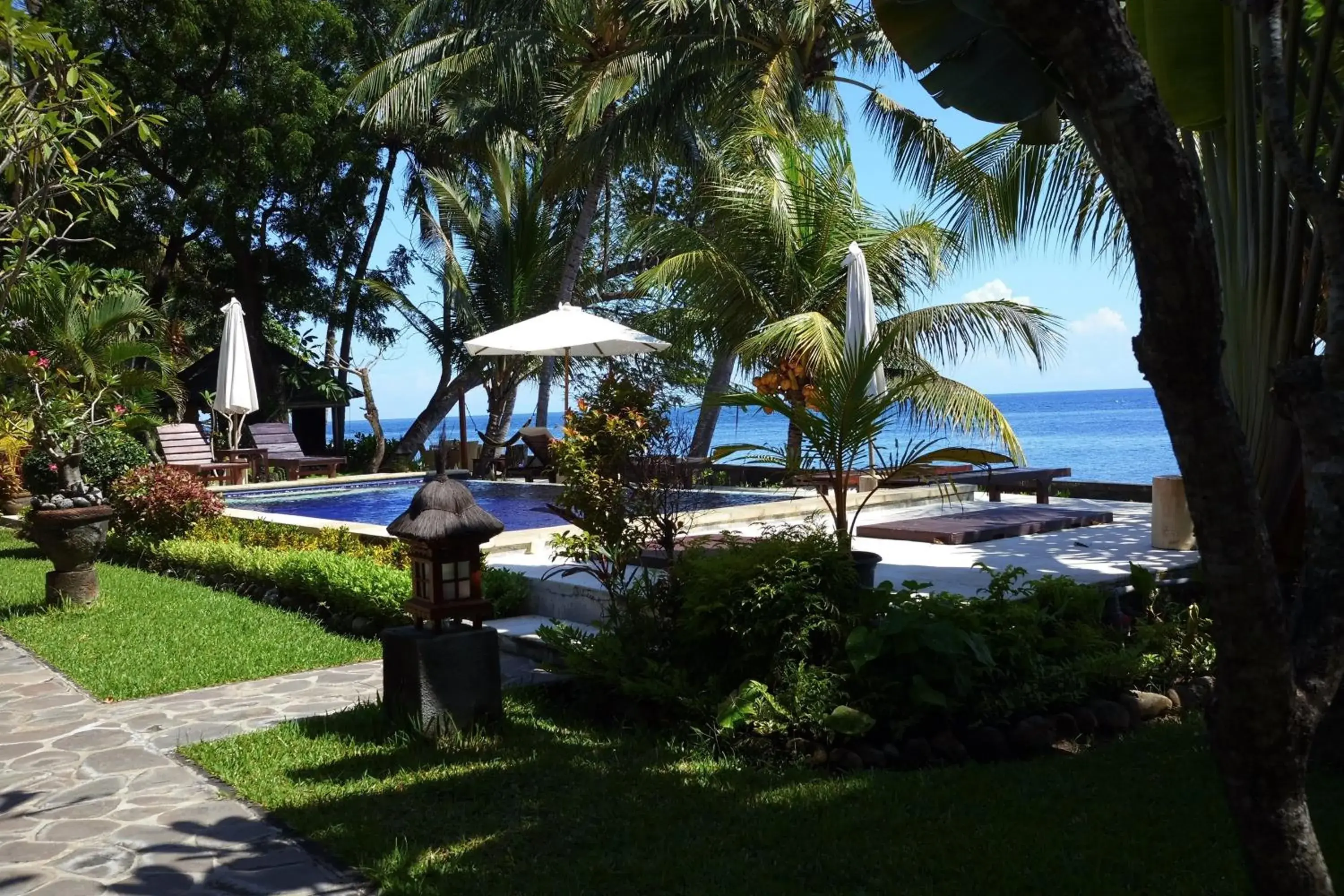 Deluxe Double Room with Side Sea View in Alam Mimpi Bali Deluxe Double Room with Side Sea View in Alam Mimpi Bali