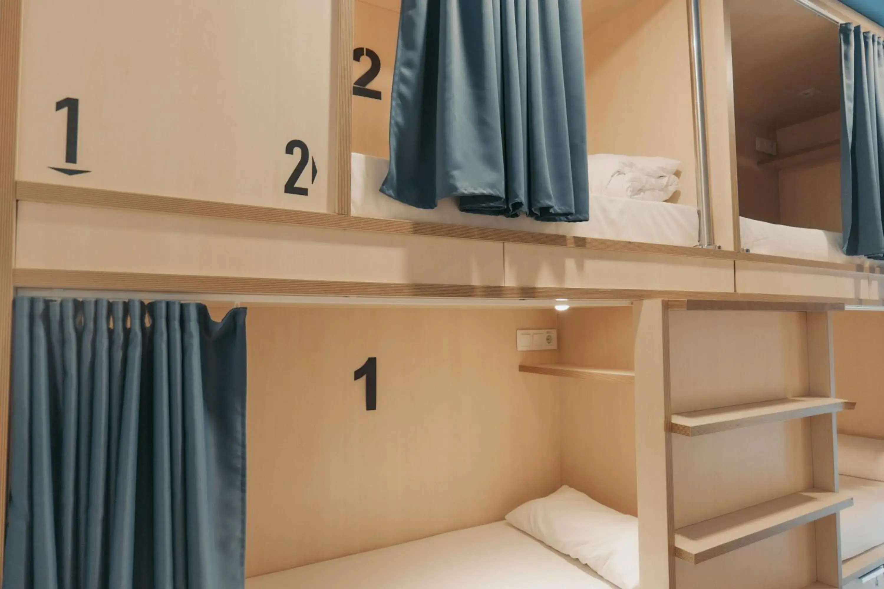 Bed in 8-Bed Mixed Dormitory Room in Mola Hostel Bed in 8-Bed Mixed Dormitory Room in Mola Hostel