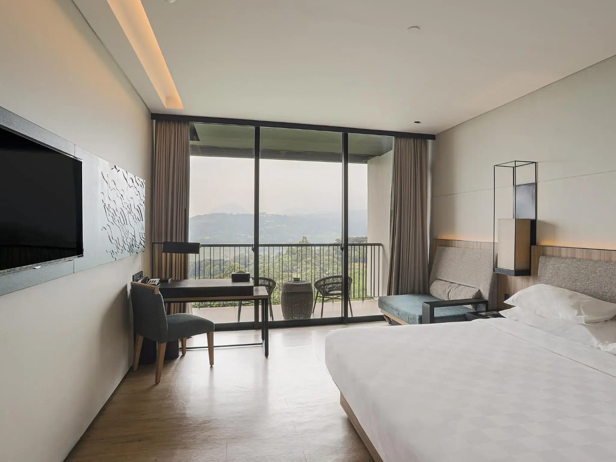 Deluxe King Room with Mountain View in Royal Tulip Gunung Geulis Resort and Golf Deluxe King Room with Mountain View in Royal Tulip Gunung Geulis Resort and Golf