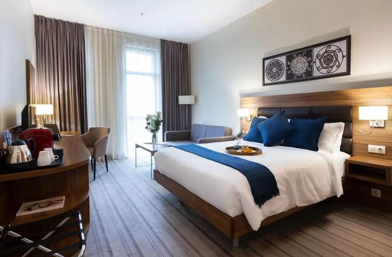 Premier Deluxe Queen Room with Complimentary Water, Free WiFi, Free Tea and Coffee Equipment in Premier Sofia Airport Hotel Premier Deluxe Queen Room with Complimentary Water, Free WiFi, Free Tea and Coffee Equipment in Premier Sofia Airport Hotel