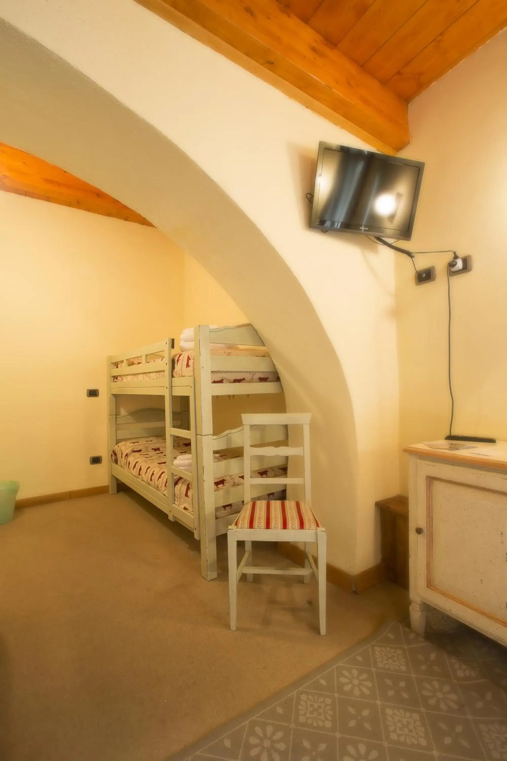 Triple Room in Hotel Chez Toi Triple Room in Hotel Chez Toi