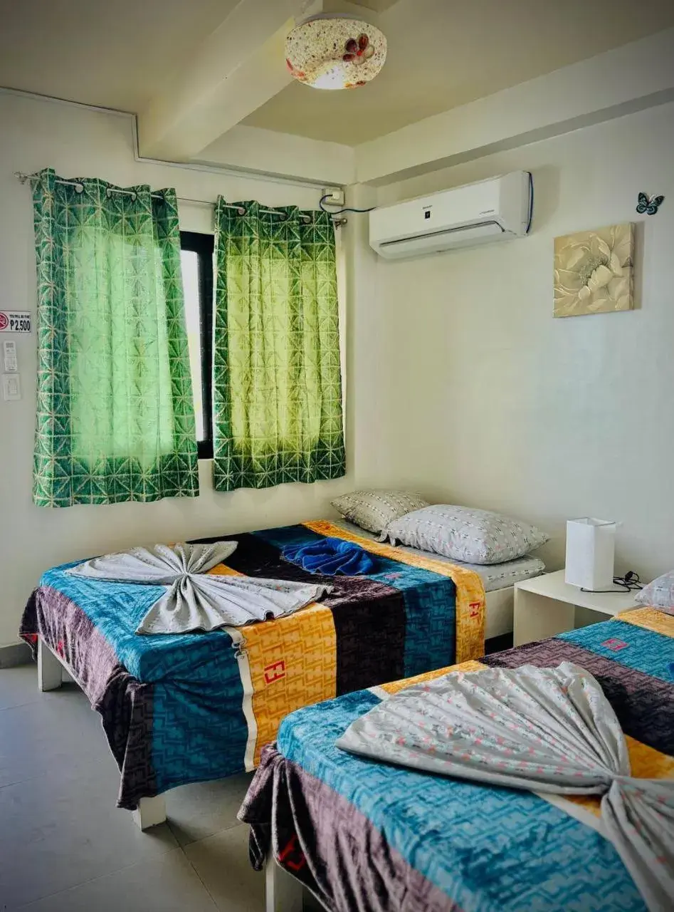 Deluxe Quadruple Room in Playa Blanca Beach Resort Deluxe Quadruple Room in Playa Blanca Beach Resort