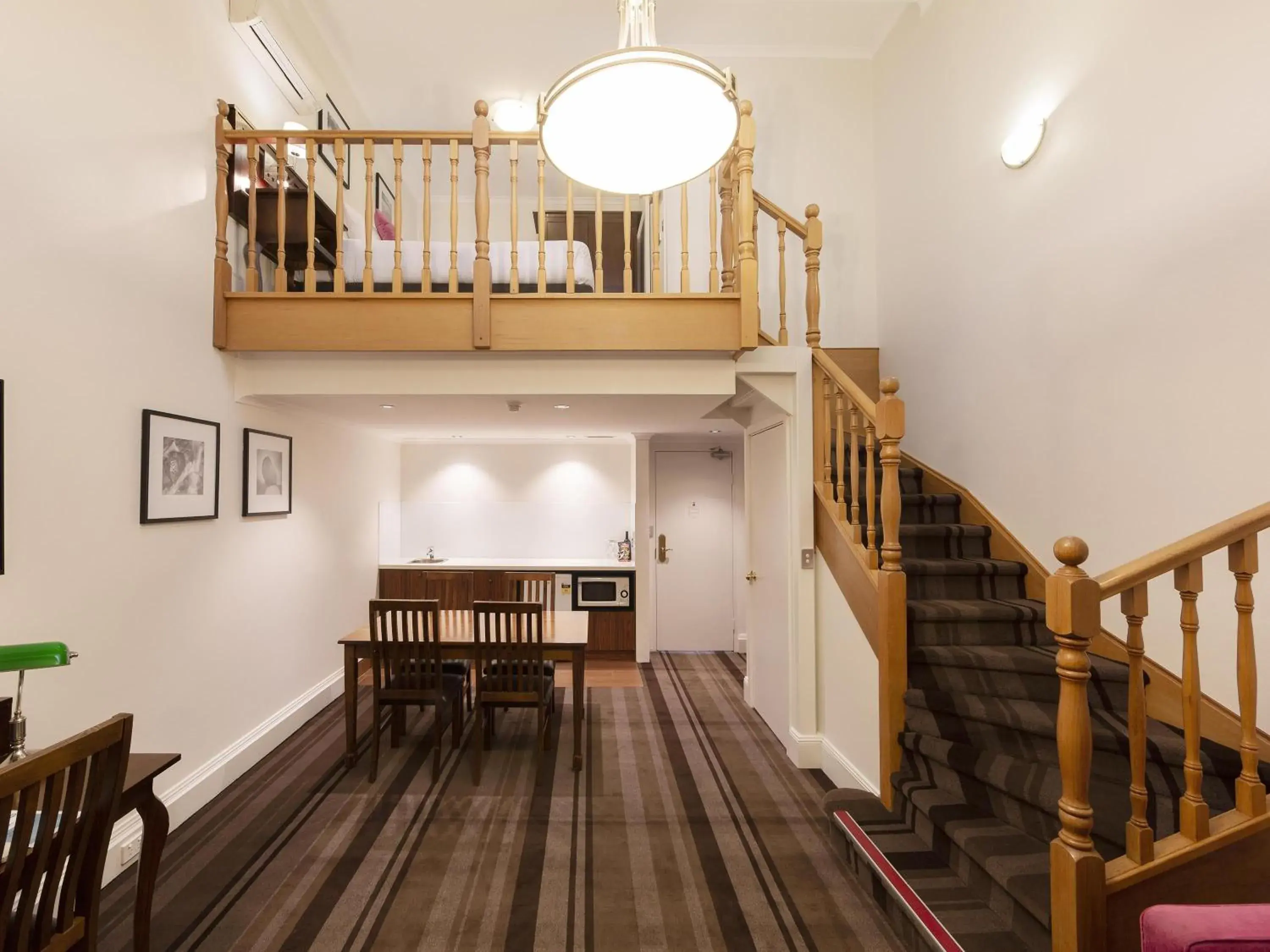 Deluxe King Loft with Sofa Bed Courtyard View in Mercure Canberra Deluxe King Loft with Sofa Bed Courtyard View in Mercure Canberra