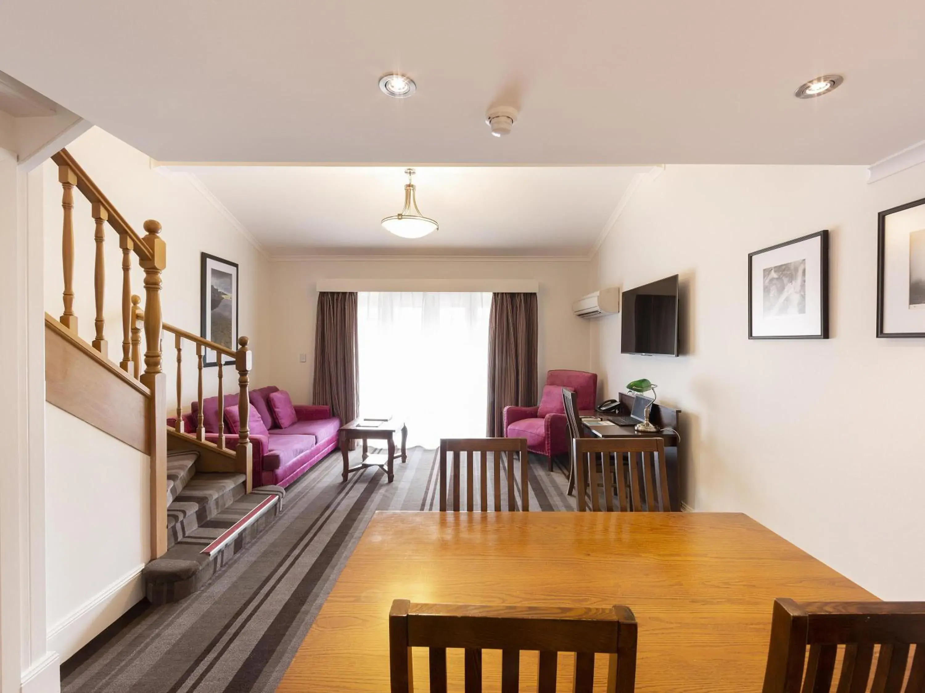 Deluxe King Loft with Sofa Bed in Mercure Canberra Deluxe King Loft with Sofa Bed in Mercure Canberra