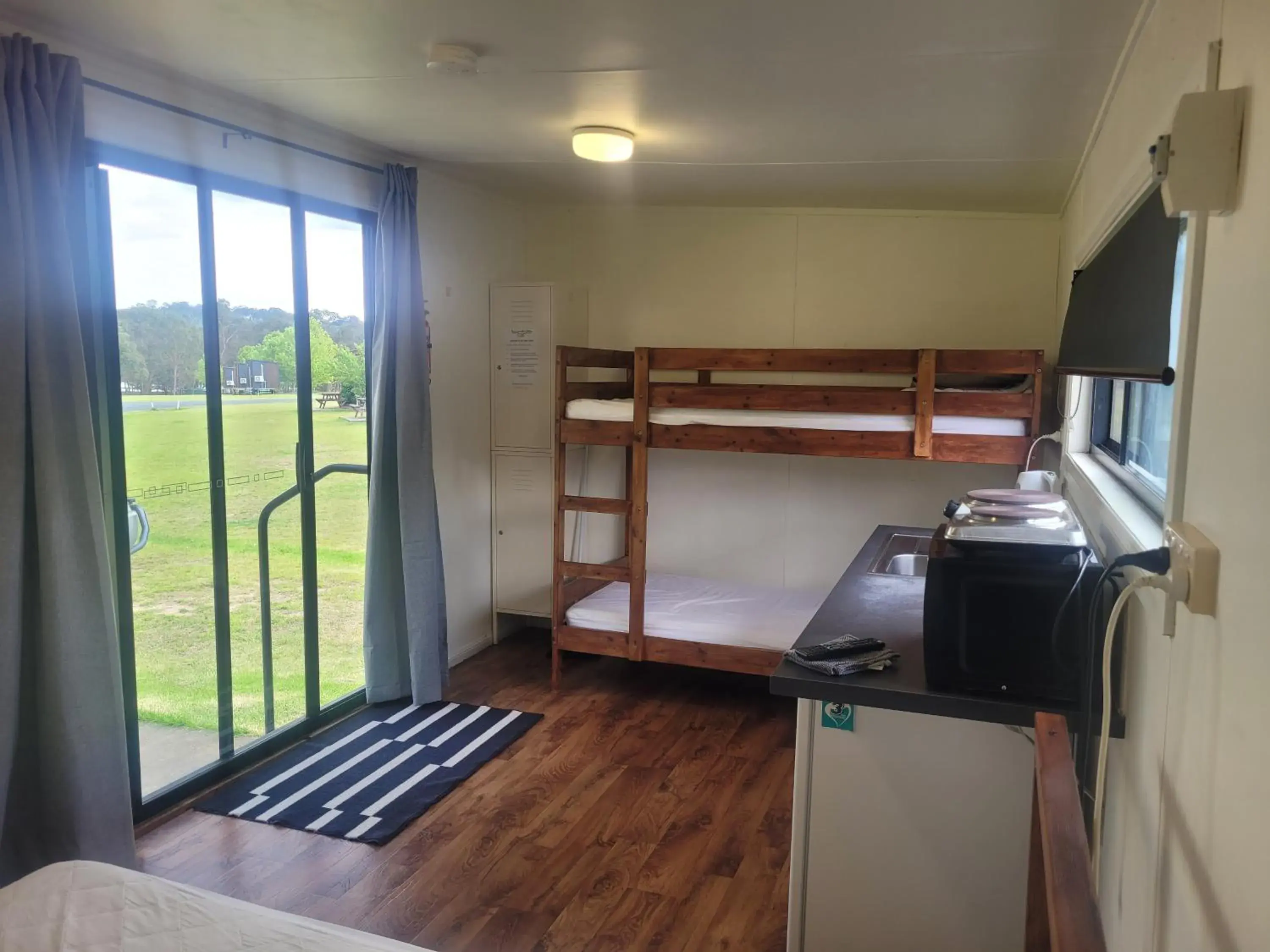 Non-Ensuite Wood Cabins (Bunk and Queen Beds) in Tiny Away Escape at Granite Belt - Sommerville Valley Non-Ensuite Wood Cabins (Bunk and Queen Beds) in Tiny Away Escape at Granite Belt - Sommerville Valley