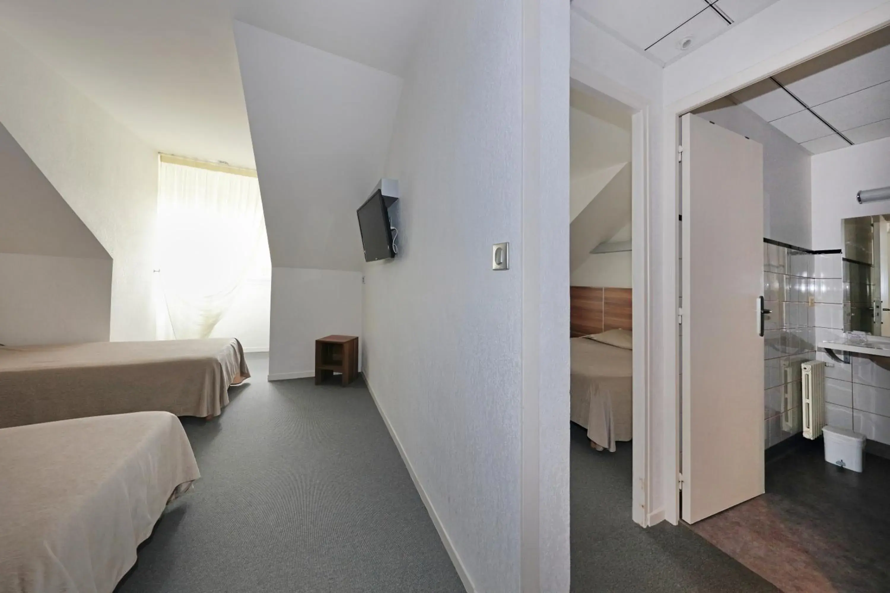 Family Room in Logis Hôtel Restaurant L'Europe Family Room in Logis Hôtel Restaurant L'Europe