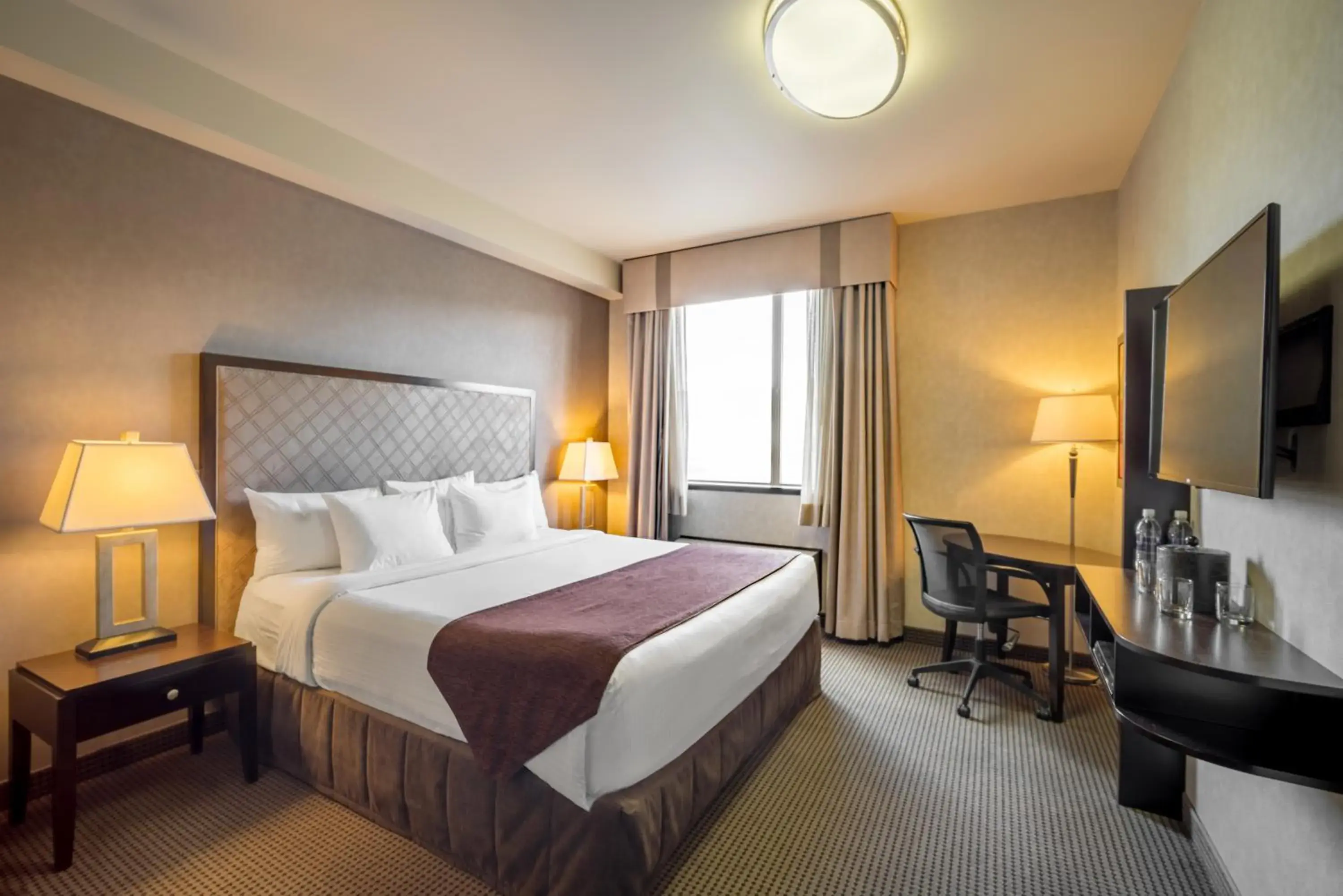 One-Bedroom King Suite with Sofa Bed in Acclaim Hotel by CLIQUE One-Bedroom King Suite with Sofa Bed in Acclaim Hotel by CLIQUE