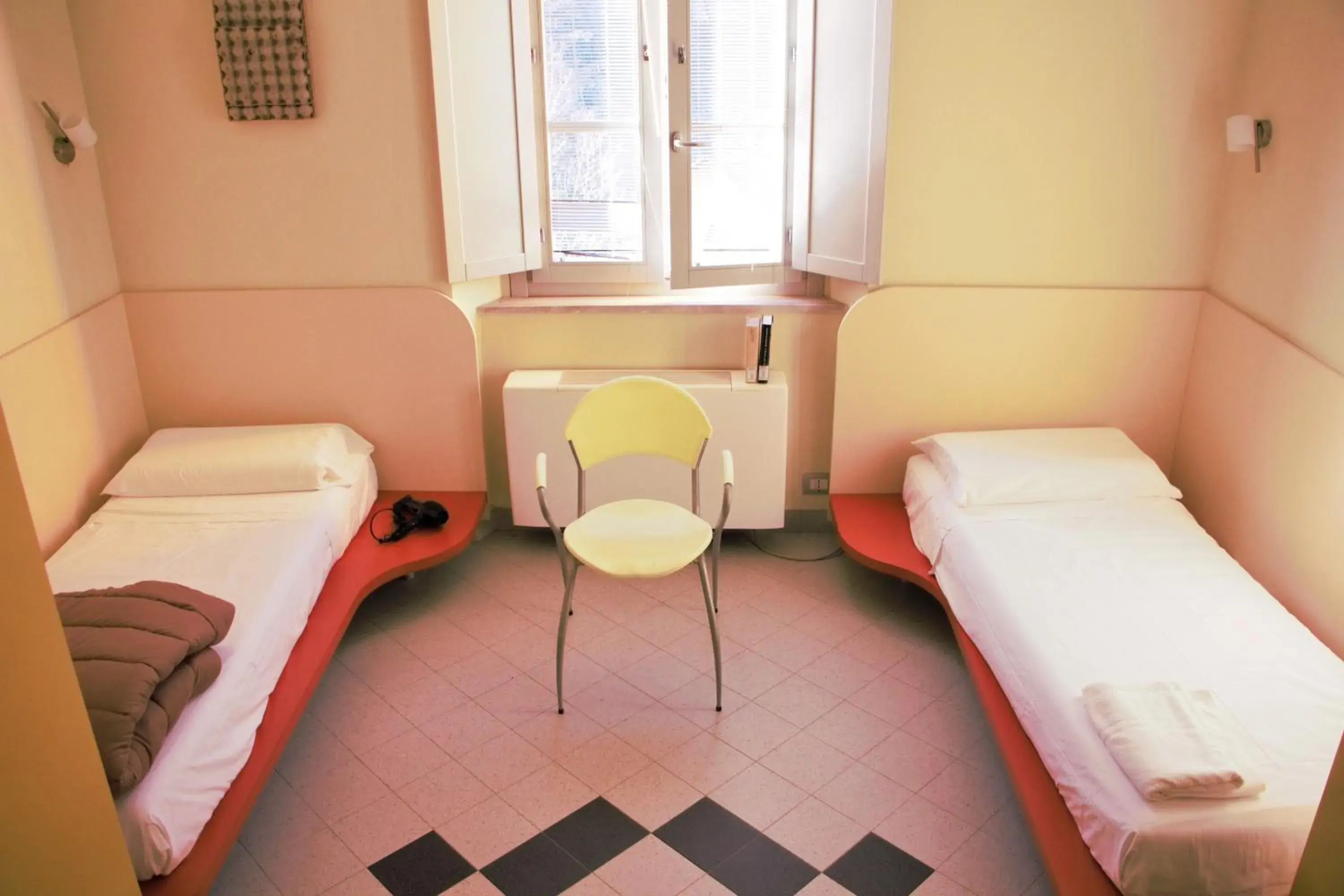 Basic Triple Room with Shared Bathroom in Ostello La Miniera Basic Triple Room with Shared Bathroom in Ostello La Miniera