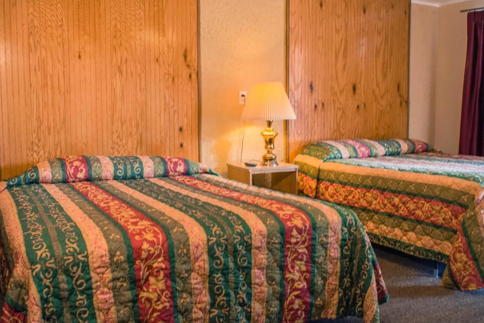 Queen Room with Two Queen Beds in Sun -N- Sand Motel Queen Room with Two Queen Beds in Sun -N- Sand Motel