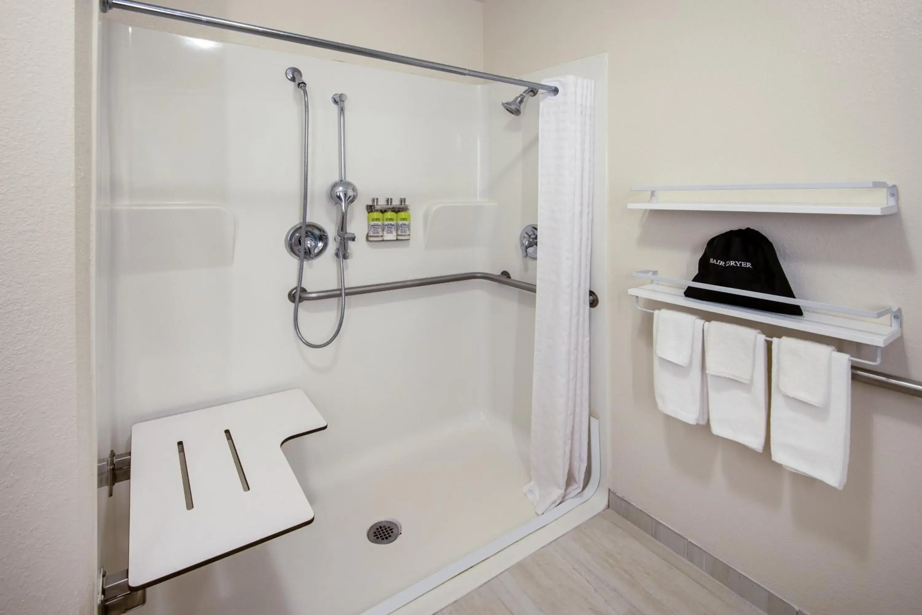 Two Double Hear Mobility Accessible Roll In Shower in Candlewood Suites Manassas by IHG Two Double Hear Mobility Accessible Roll In Shower in Candlewood Suites Manassas by IHG