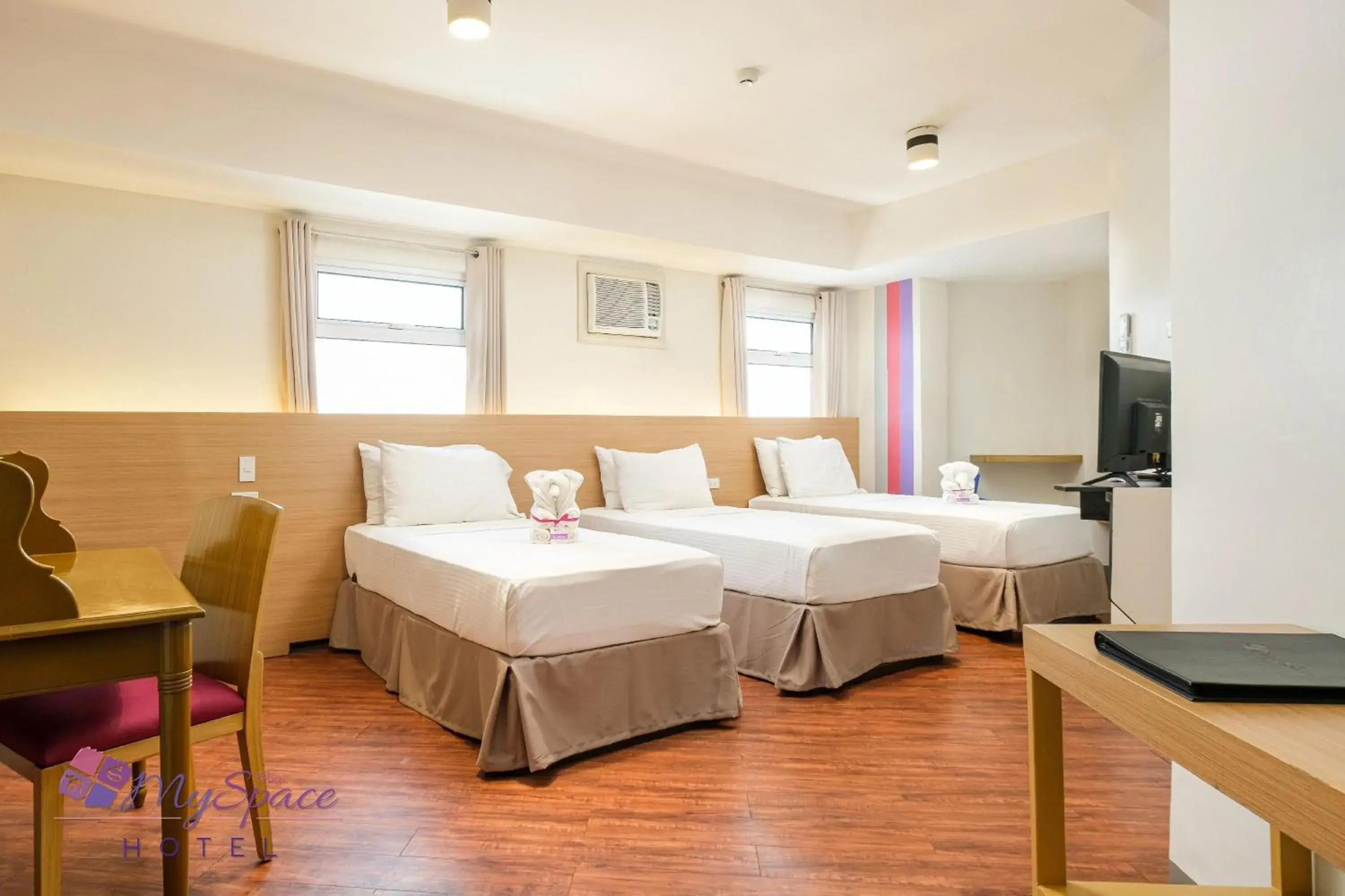 Supreme Triple Room in MySpace Hotel @BGC Supreme Triple Room in MySpace Hotel @BGC