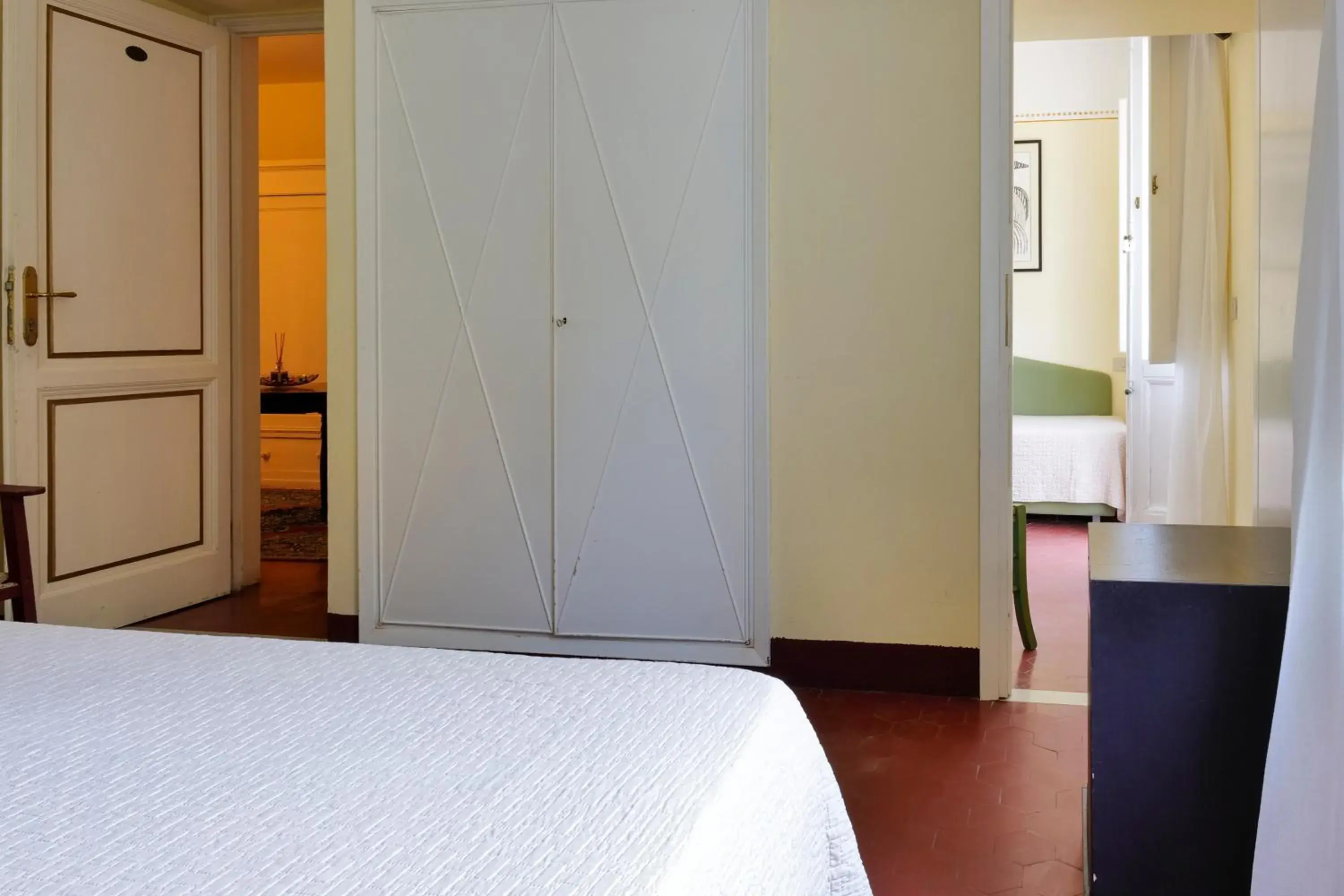 Triple Room with Garden View in Hotel Club i Pini - Residenza d'Epoca in Versilia Triple Room with Garden View in Hotel Club i Pini - Residenza d'Epoca in Versilia