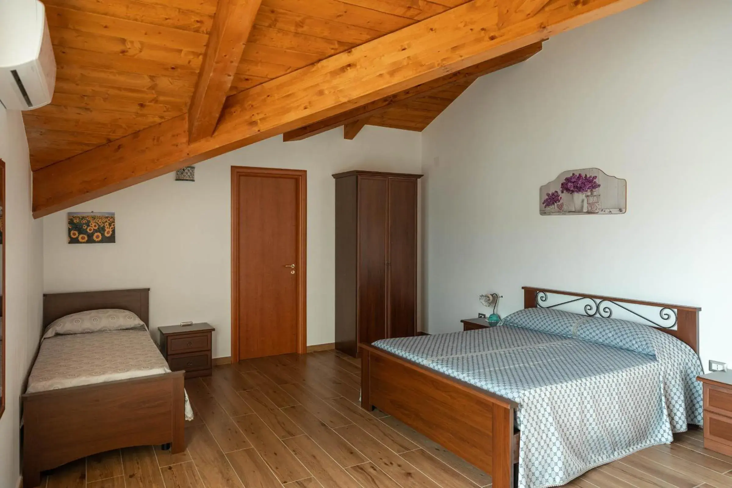 Deluxe Room (2 Adults + 1 Child) in B&B La Mortella Deluxe Room (2 Adults + 1 Child) in B&B La Mortella