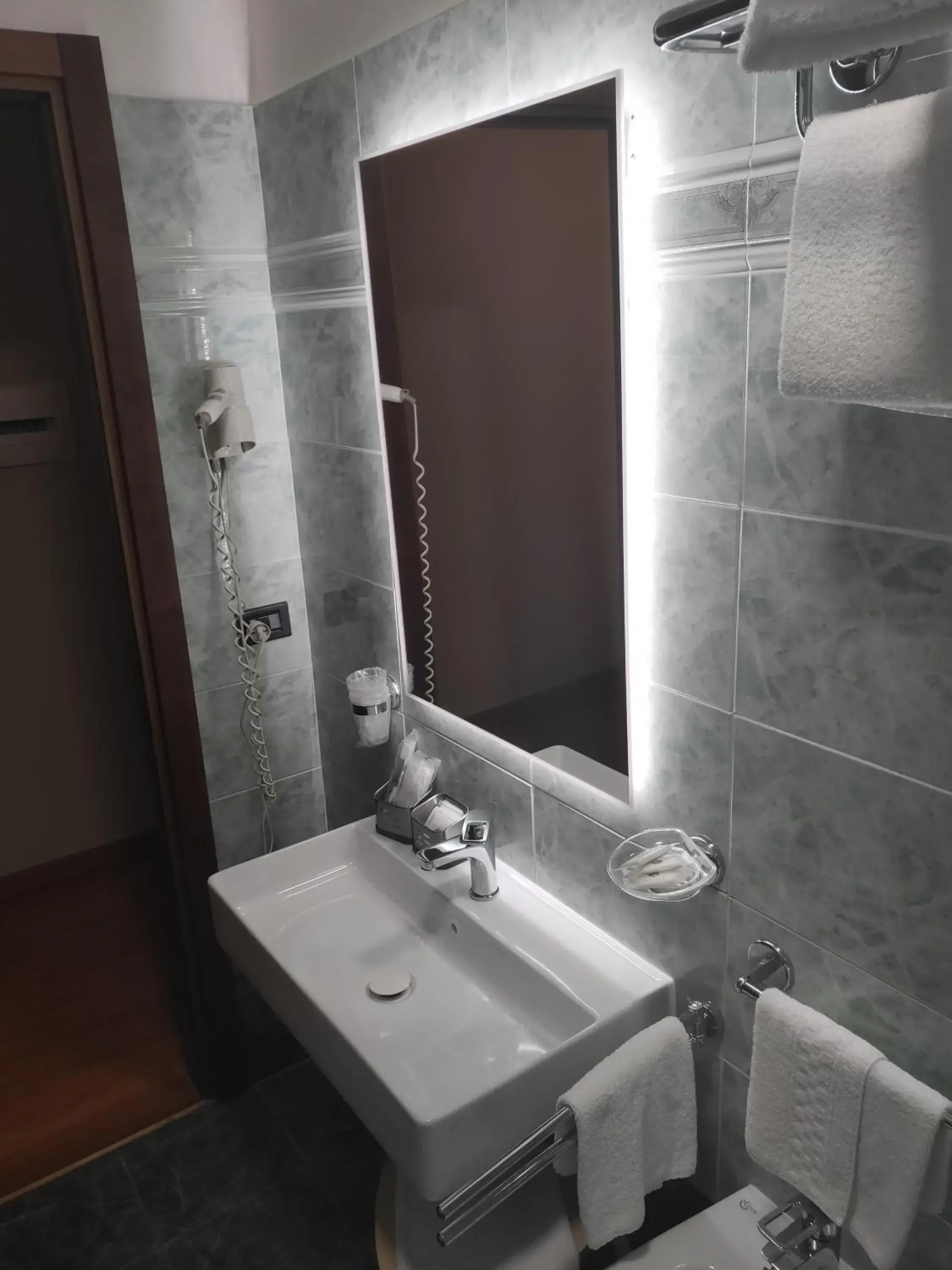 Triple Room in Hotel La Vignetta Triple Room in Hotel La Vignetta