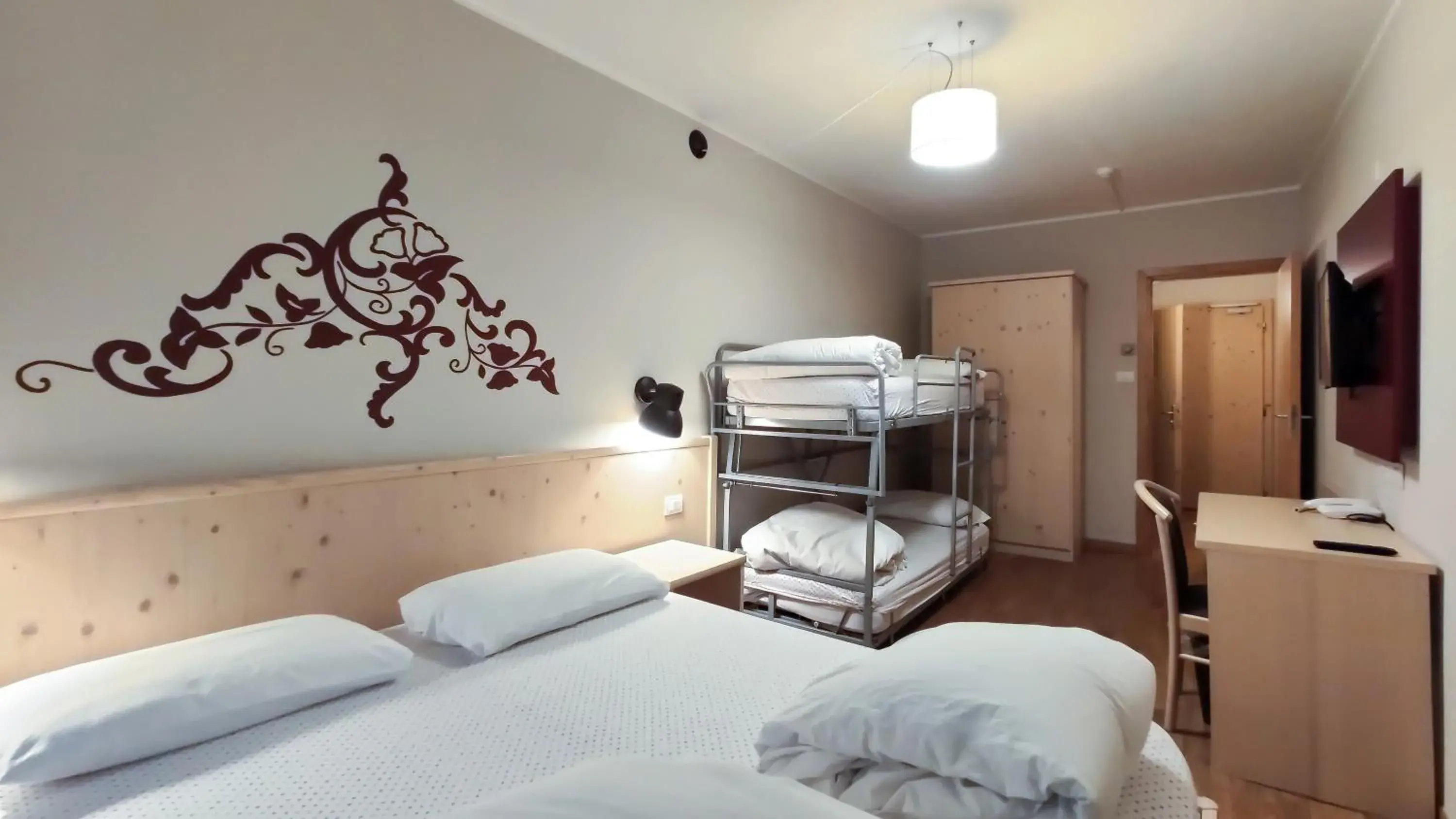 Quadruple Room (2 Adults + 2 Children) in Hotel Principe Marmolada Quadruple Room (2 Adults + 2 Children) in Hotel Principe Marmolada