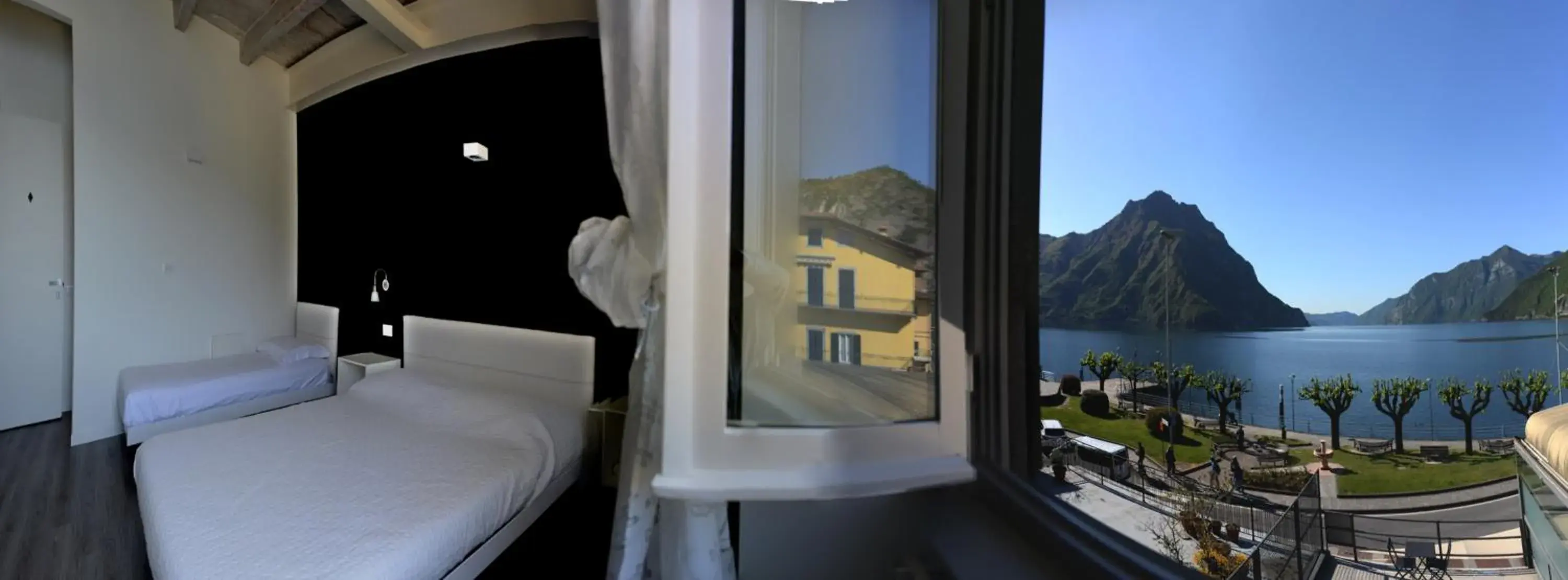Triple Room with Lake View in Iseo Lake - Rooms & Apartments Triple Room with Lake View in Iseo Lake - Rooms & Apartments