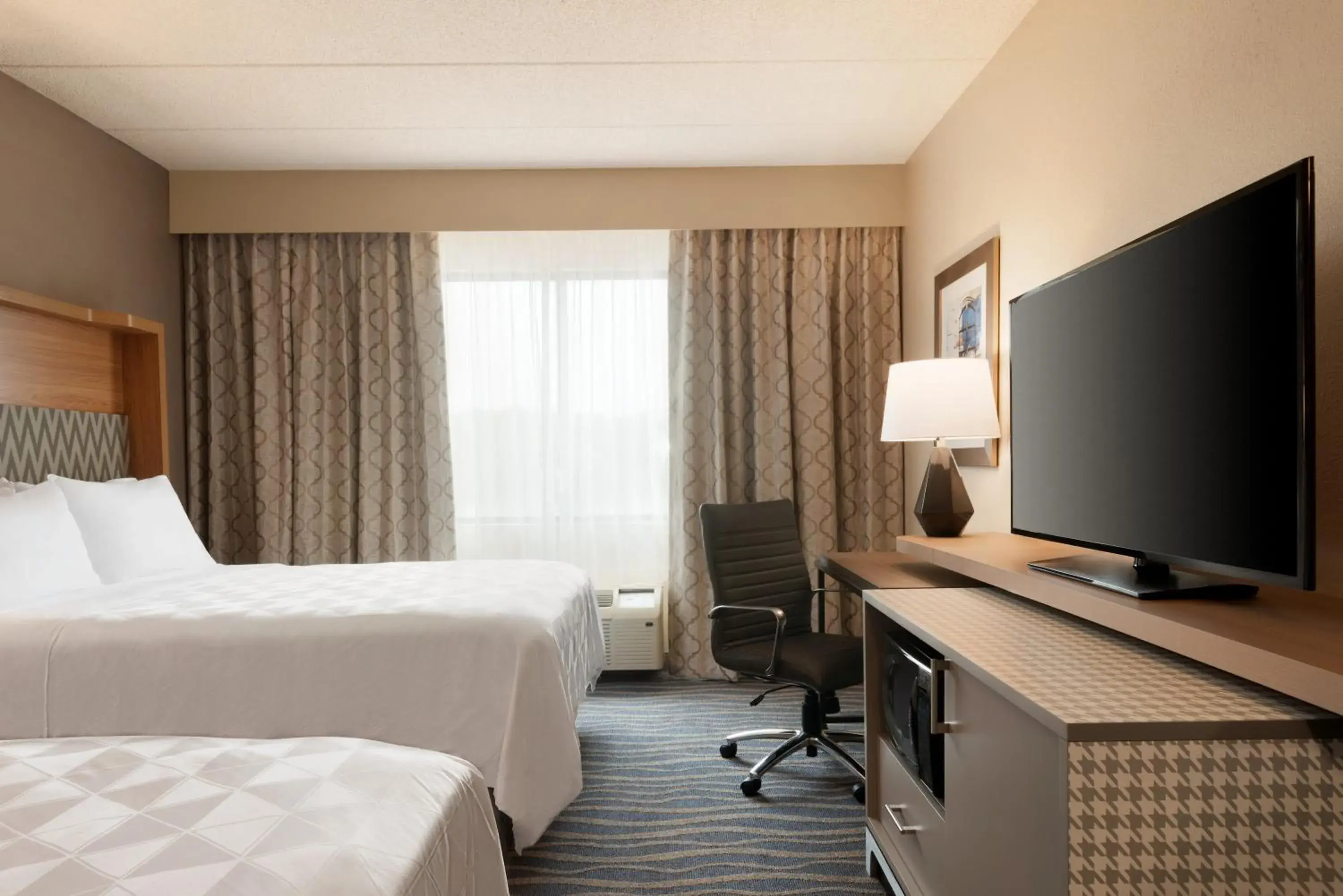 Standard Queen Room with Two Queen Beds in Holiday Inn Hotel & Suites Council Bluffs by IHG Standard Queen Room with Two Queen Beds in Holiday Inn Hotel & Suites Council Bluffs by IHG