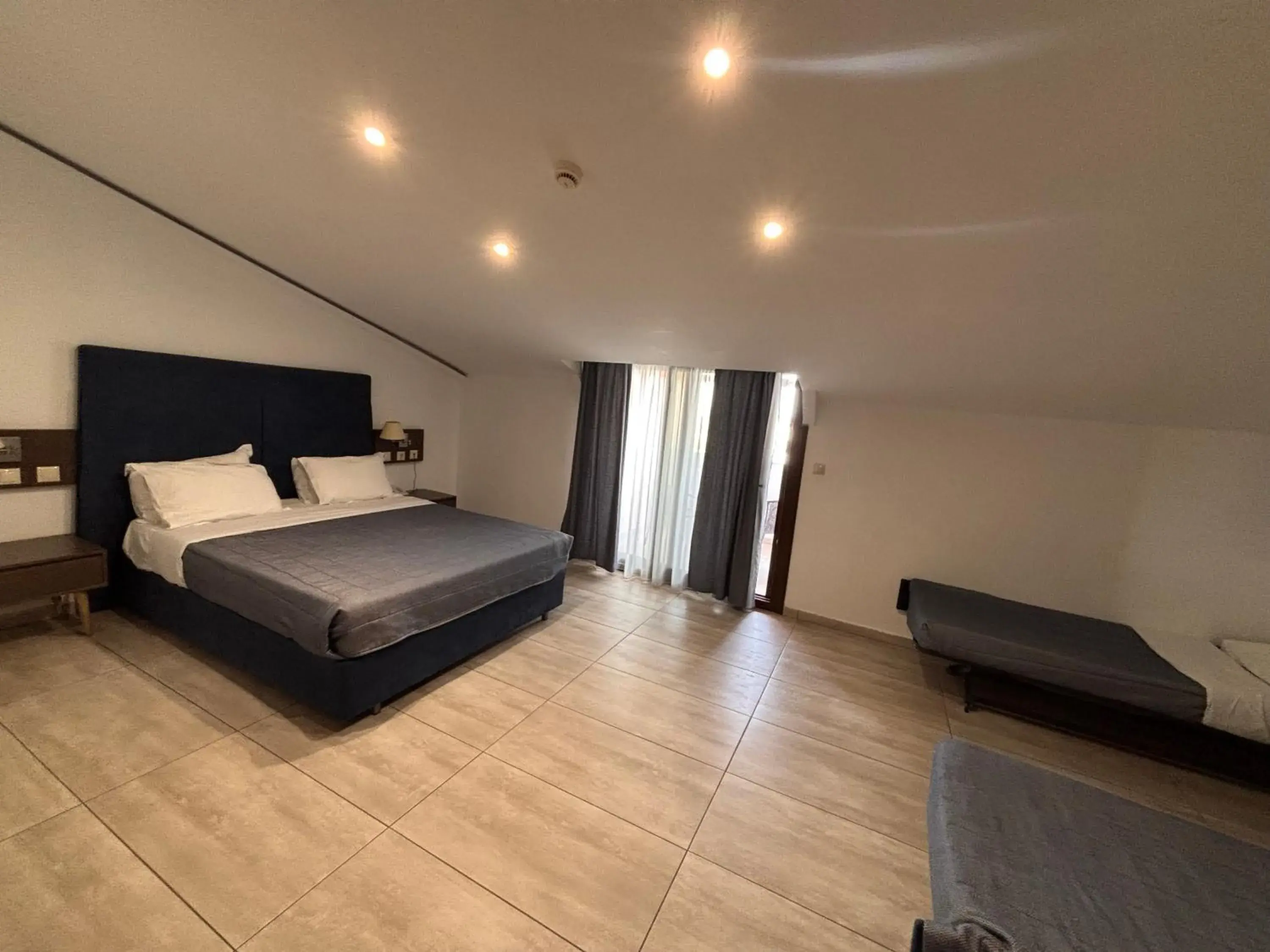 Attic Family Room in Perinthos Hotel Attic Family Room in Perinthos Hotel