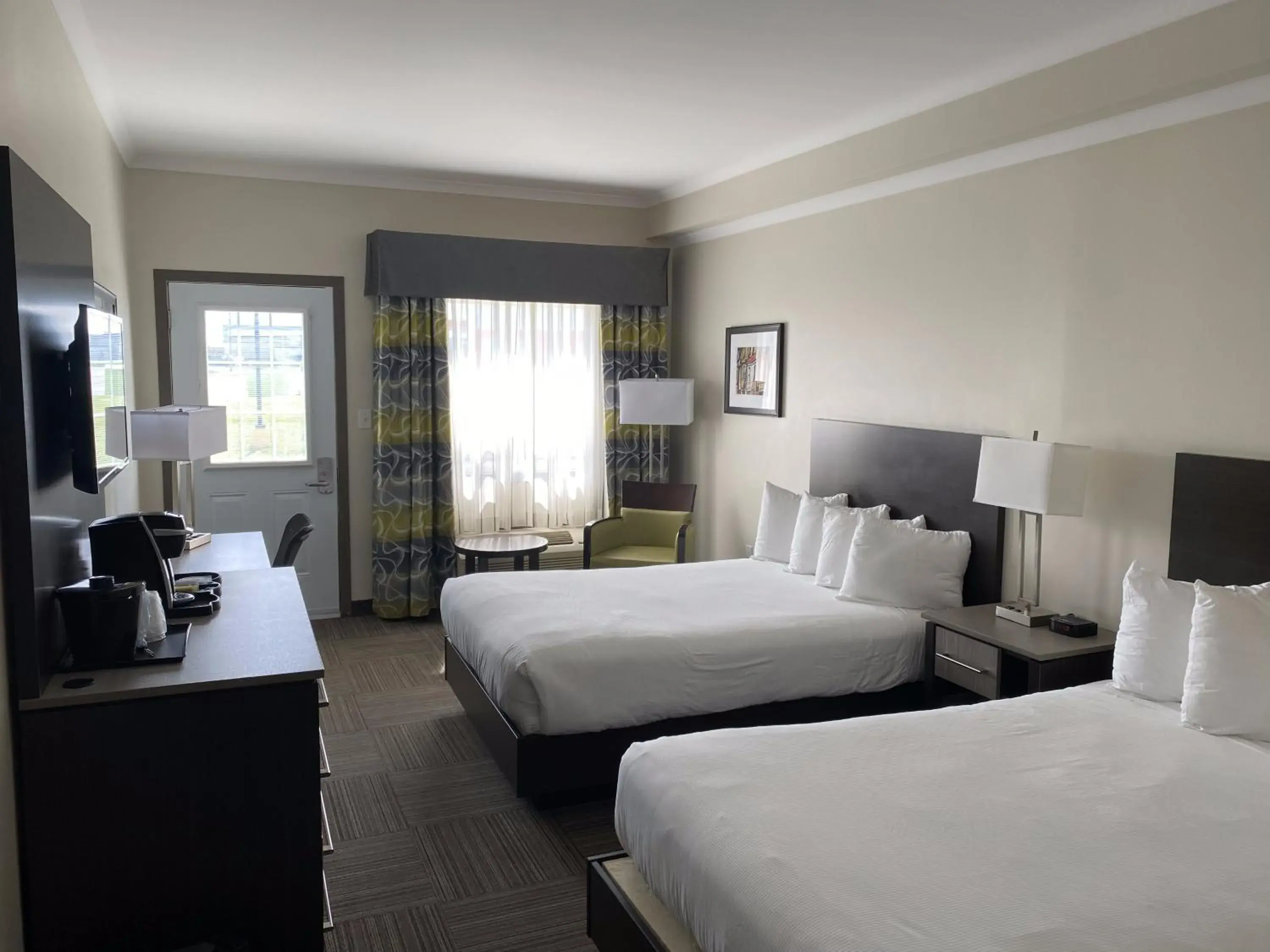 Double Room with Two Double Beds with Bath Tub in Crossroads Inn & Suites Double Room with Two Double Beds with Bath Tub in Crossroads Inn & Suites