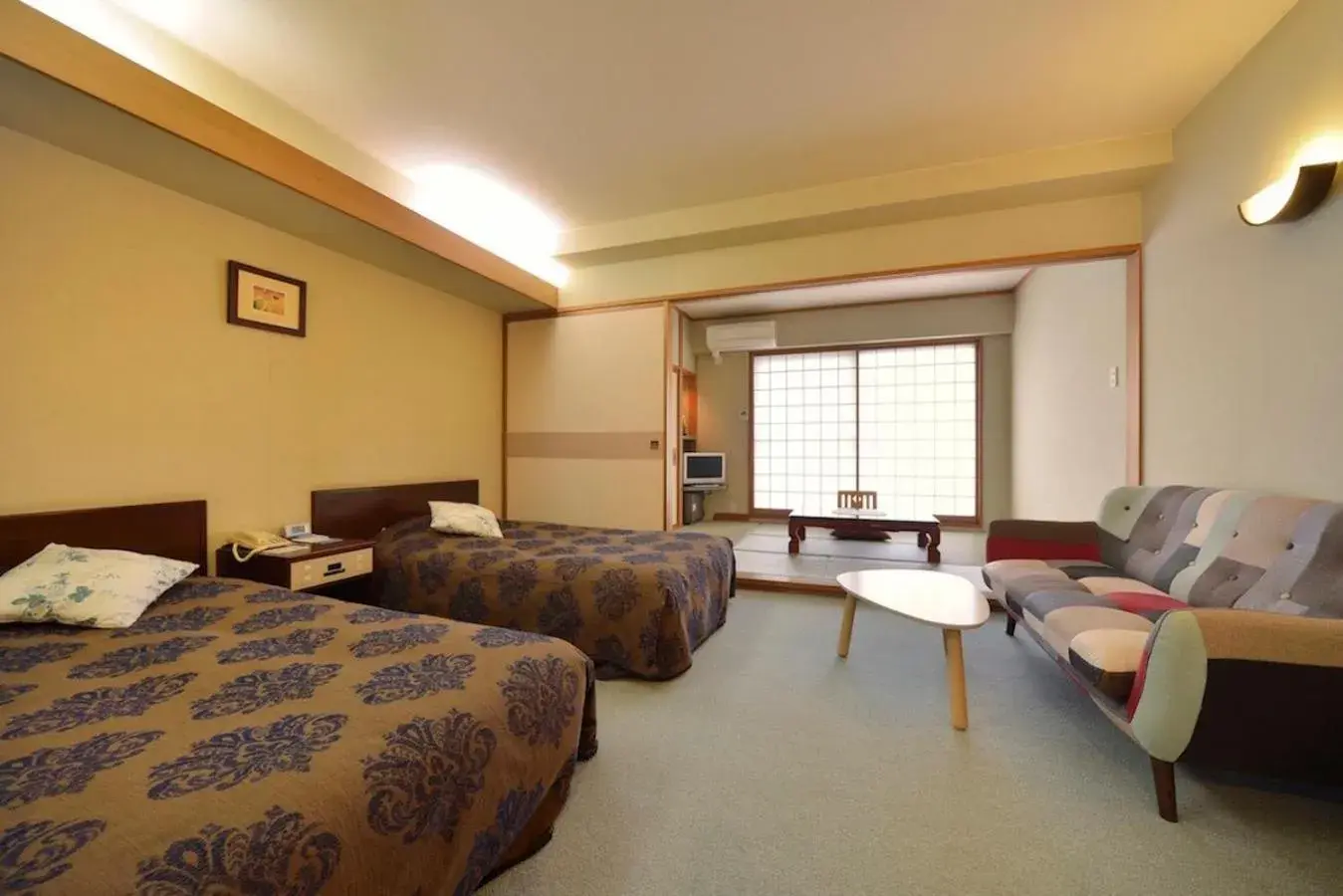 Twin Room with Tatami Area in Mashikokan Satoyama Resort Hotel Twin Room with Tatami Area in Mashikokan Satoyama Resort Hotel