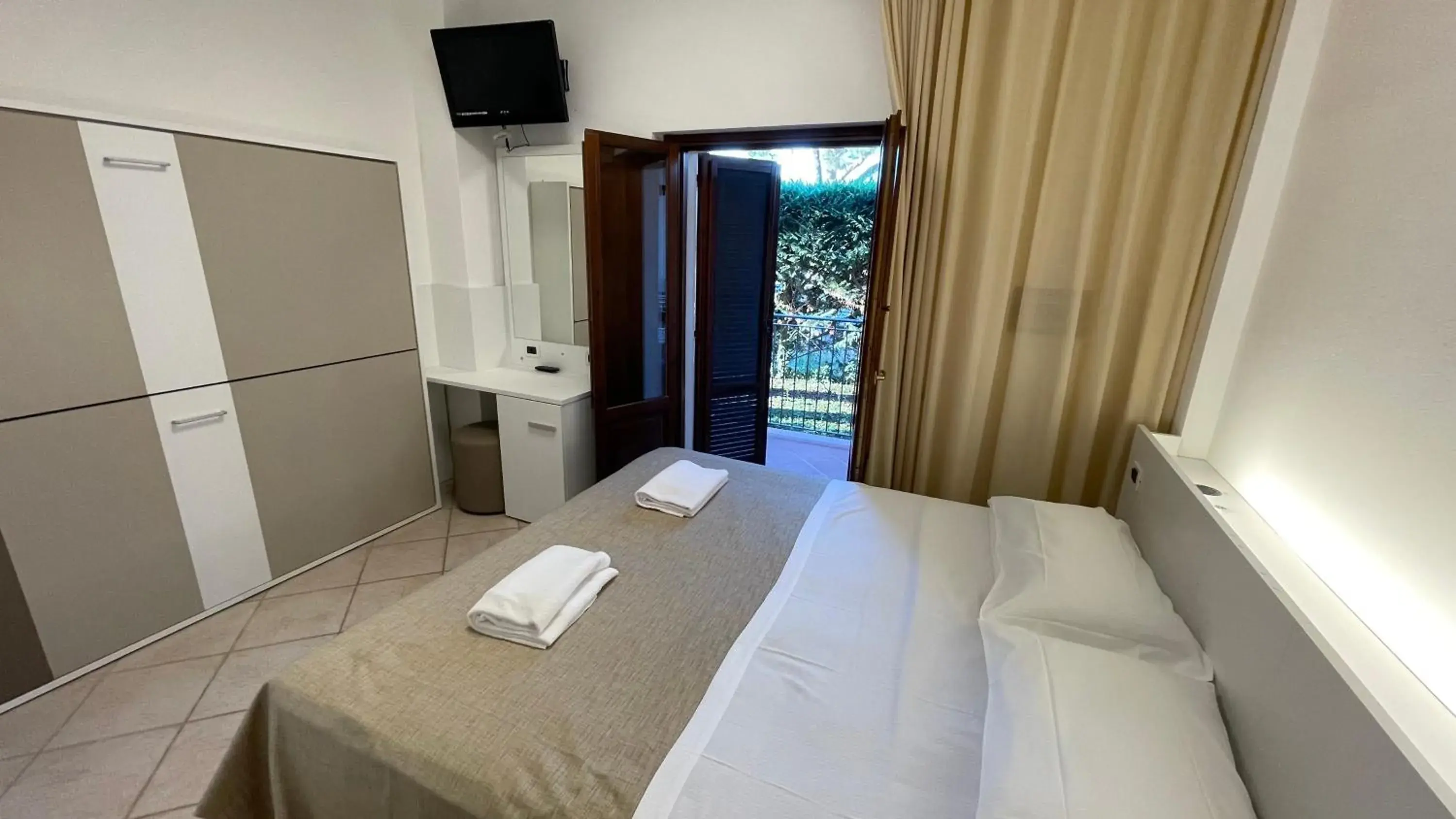 Standard Quadruple Room in Hotel Boschetto Standard Quadruple Room in Hotel Boschetto