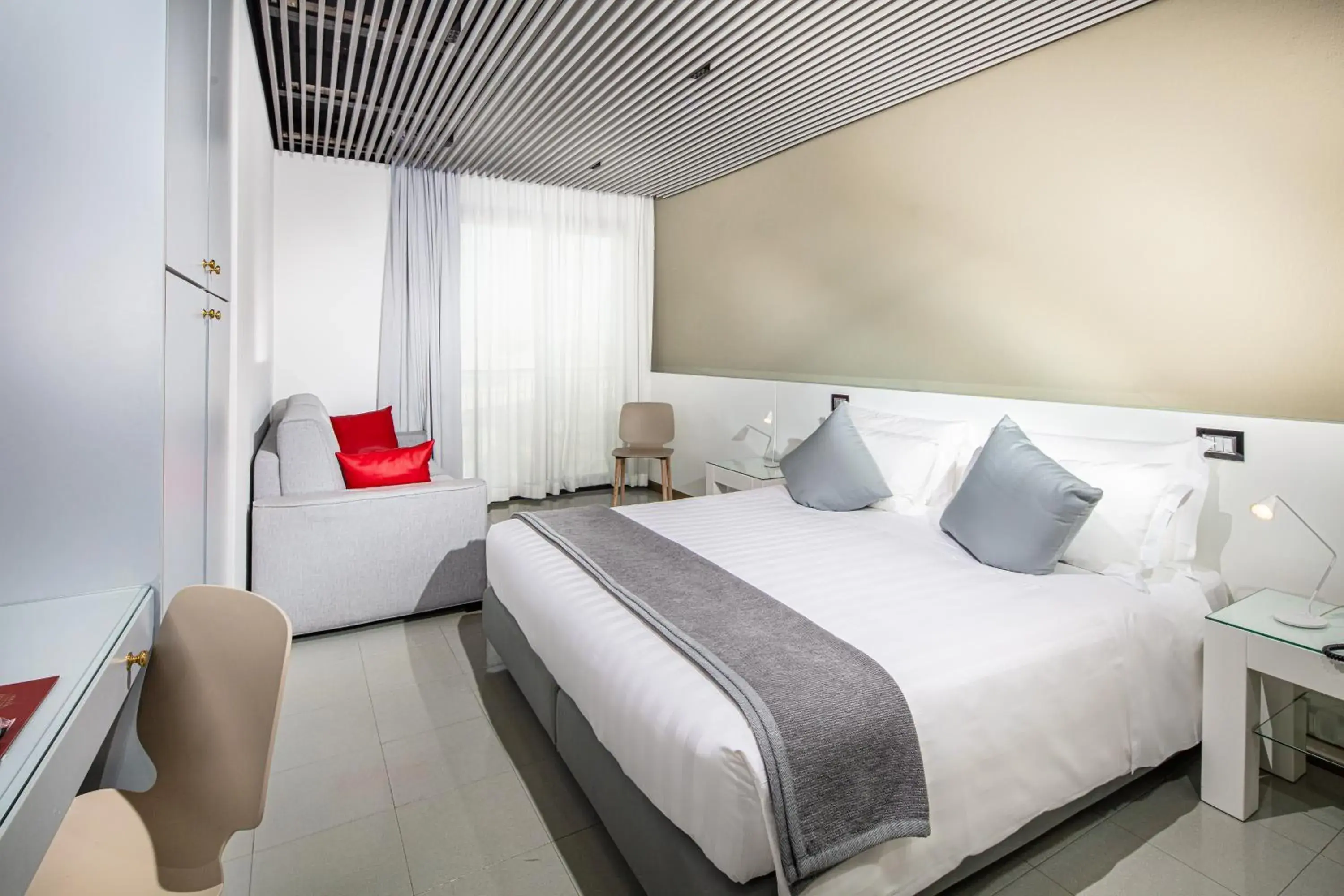 Comfort Double Room with Extra Bed in Monaco Suites Hotel Comfort Double Room with Extra Bed in Monaco Suites Hotel