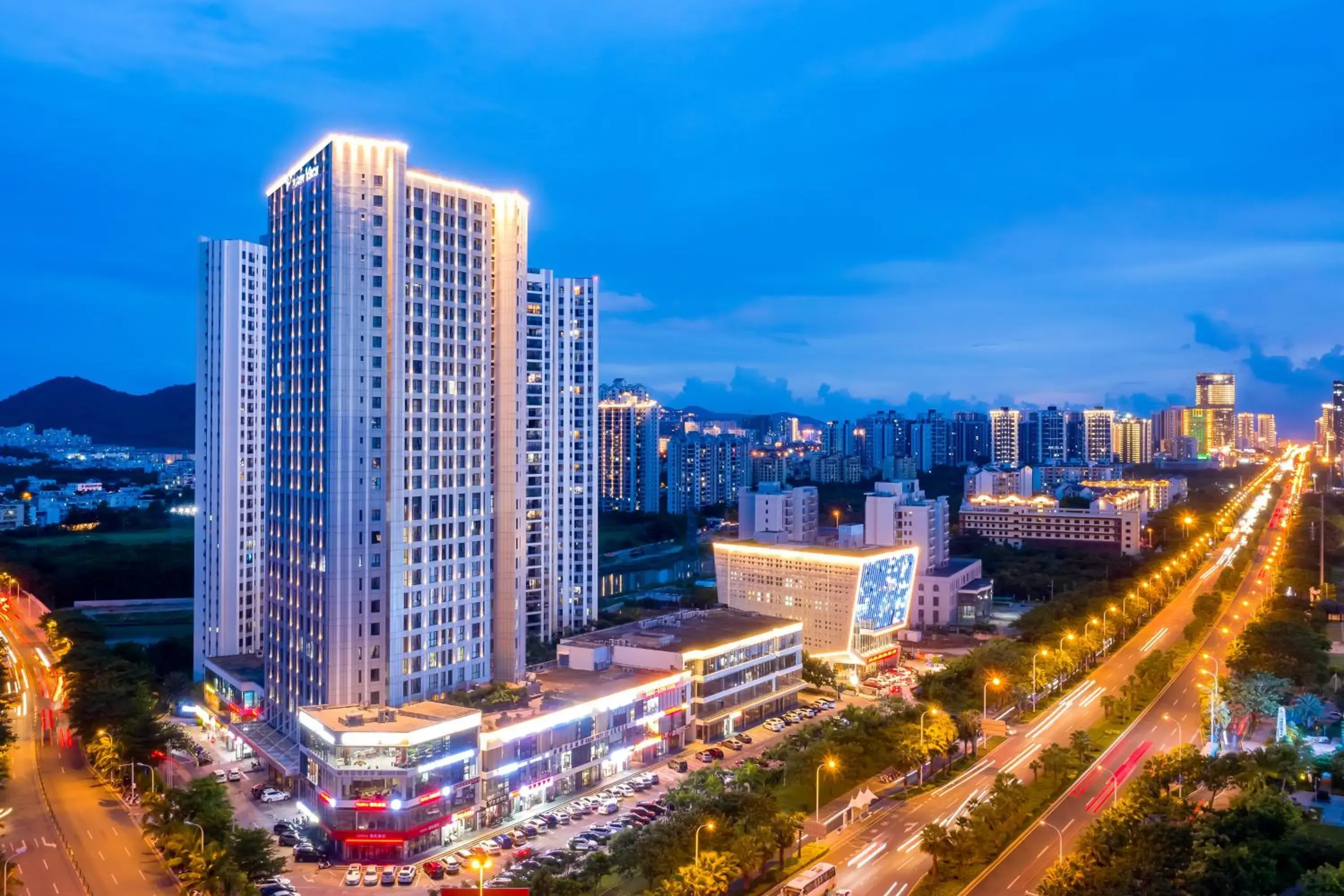 Property building in Paxton Vacances Hotel & Suite Sanya Property building in Paxton Vacances Hotel & Suite Sanya