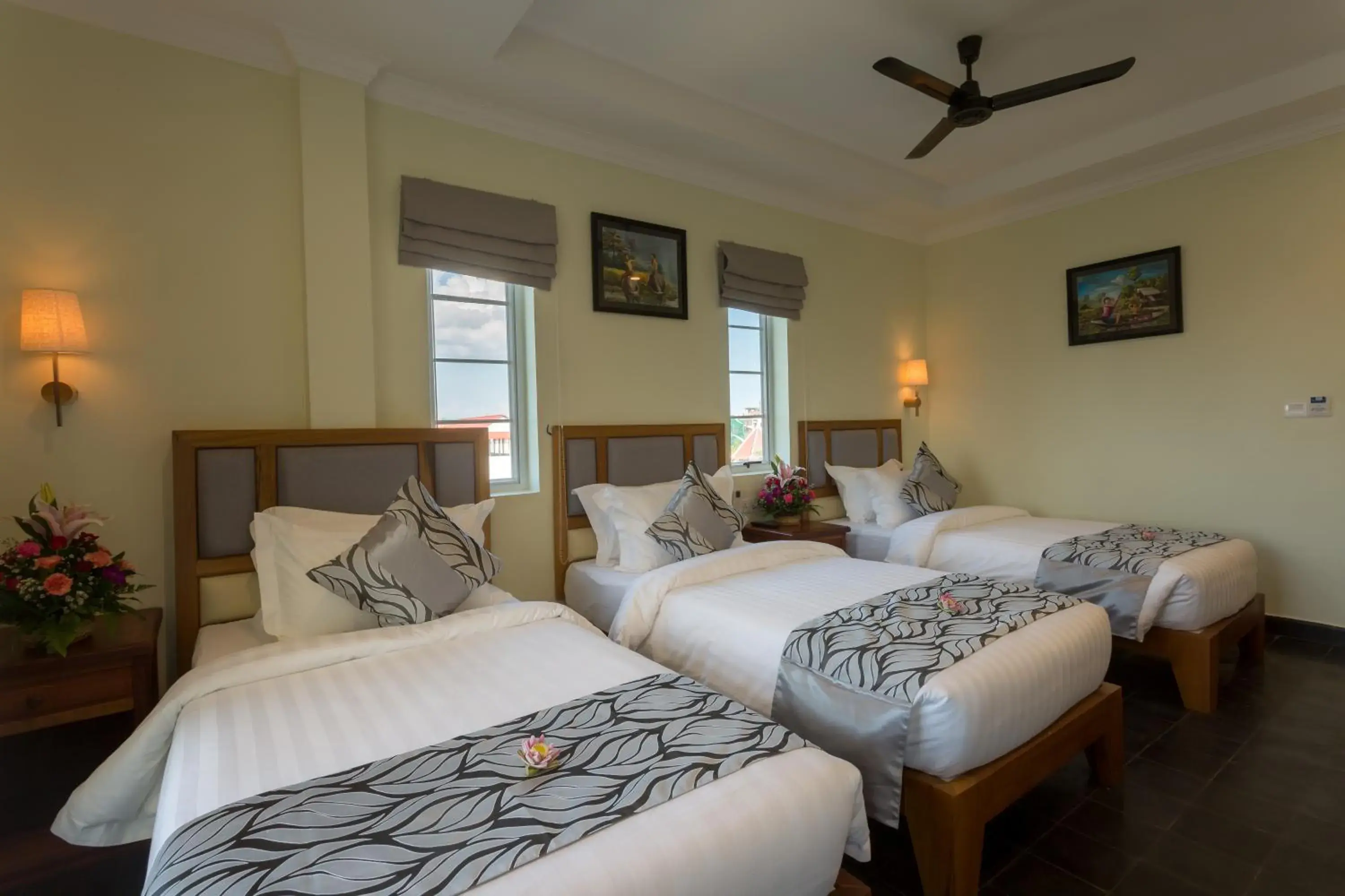 Deluxe Triple Room with Balcony in Grand Bayon Siem Reap Hotel Deluxe Triple Room with Balcony in Grand Bayon Siem Reap Hotel