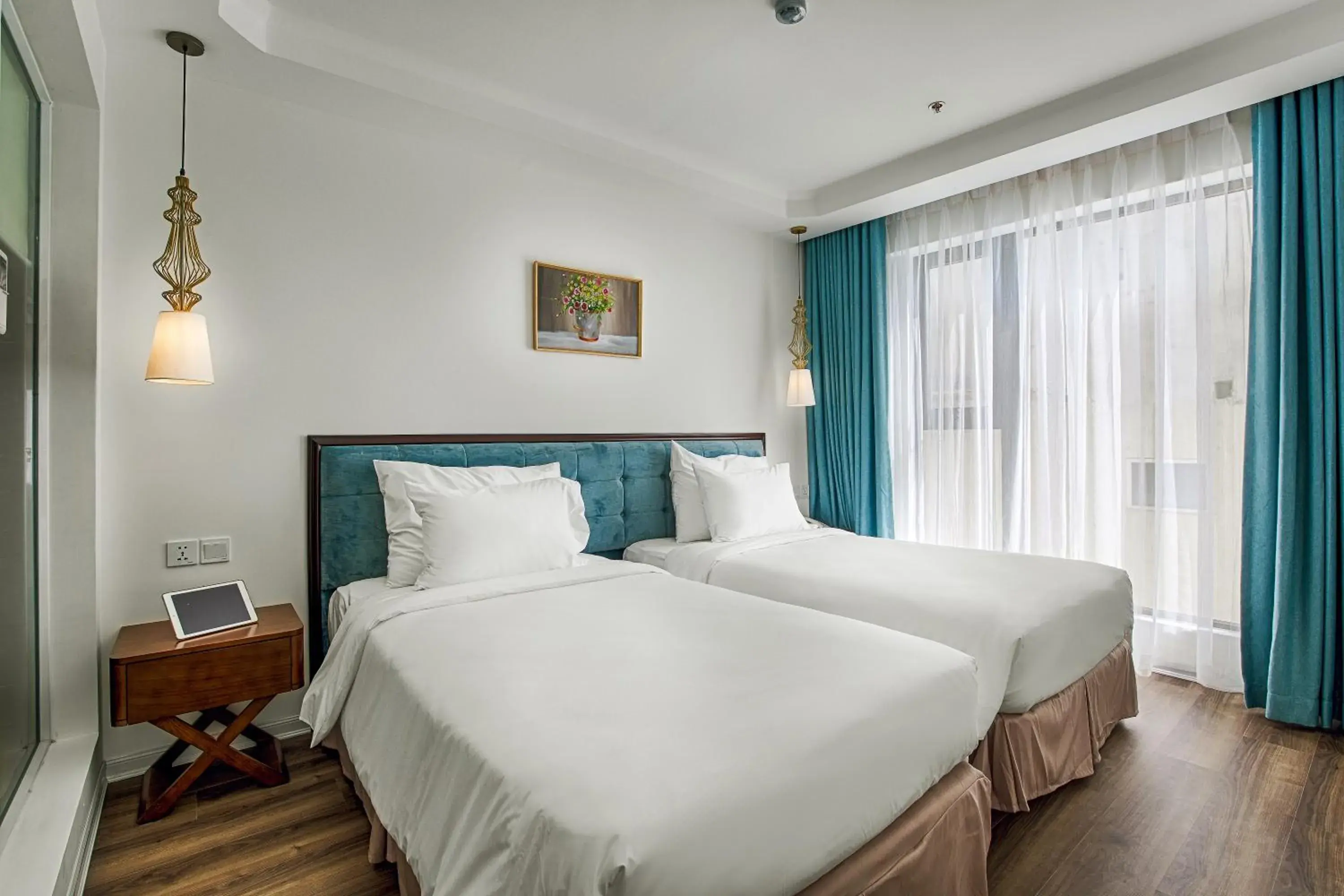 Deluxe Twin Room with Partial Ocean View in Adaline Hotel and Suite Deluxe Twin Room with Partial Ocean View in Adaline Hotel and Suite