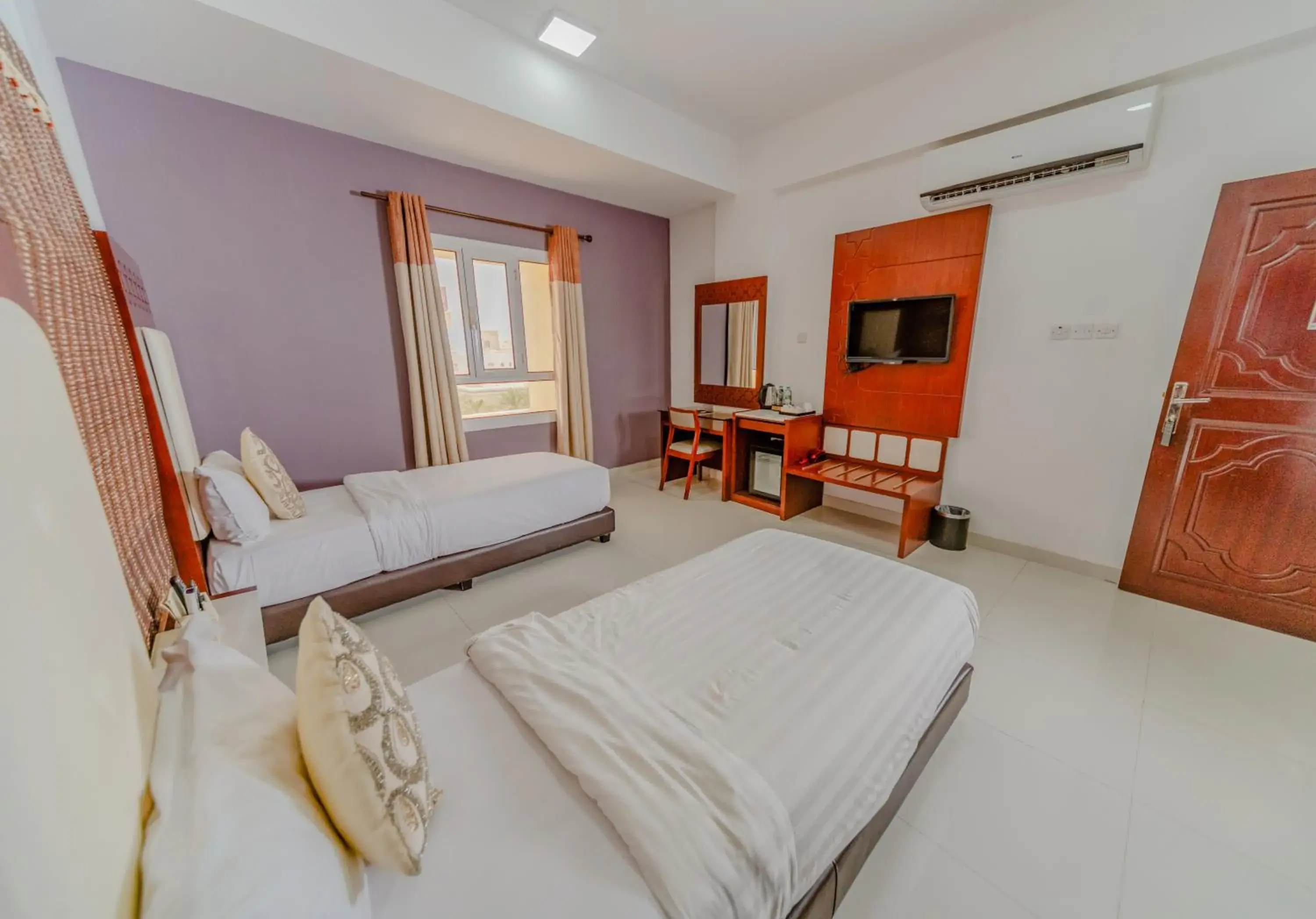 Standard Twin Room with Sofa in Zaki Hotel Apartment Standard Twin Room with Sofa in Zaki Hotel Apartment