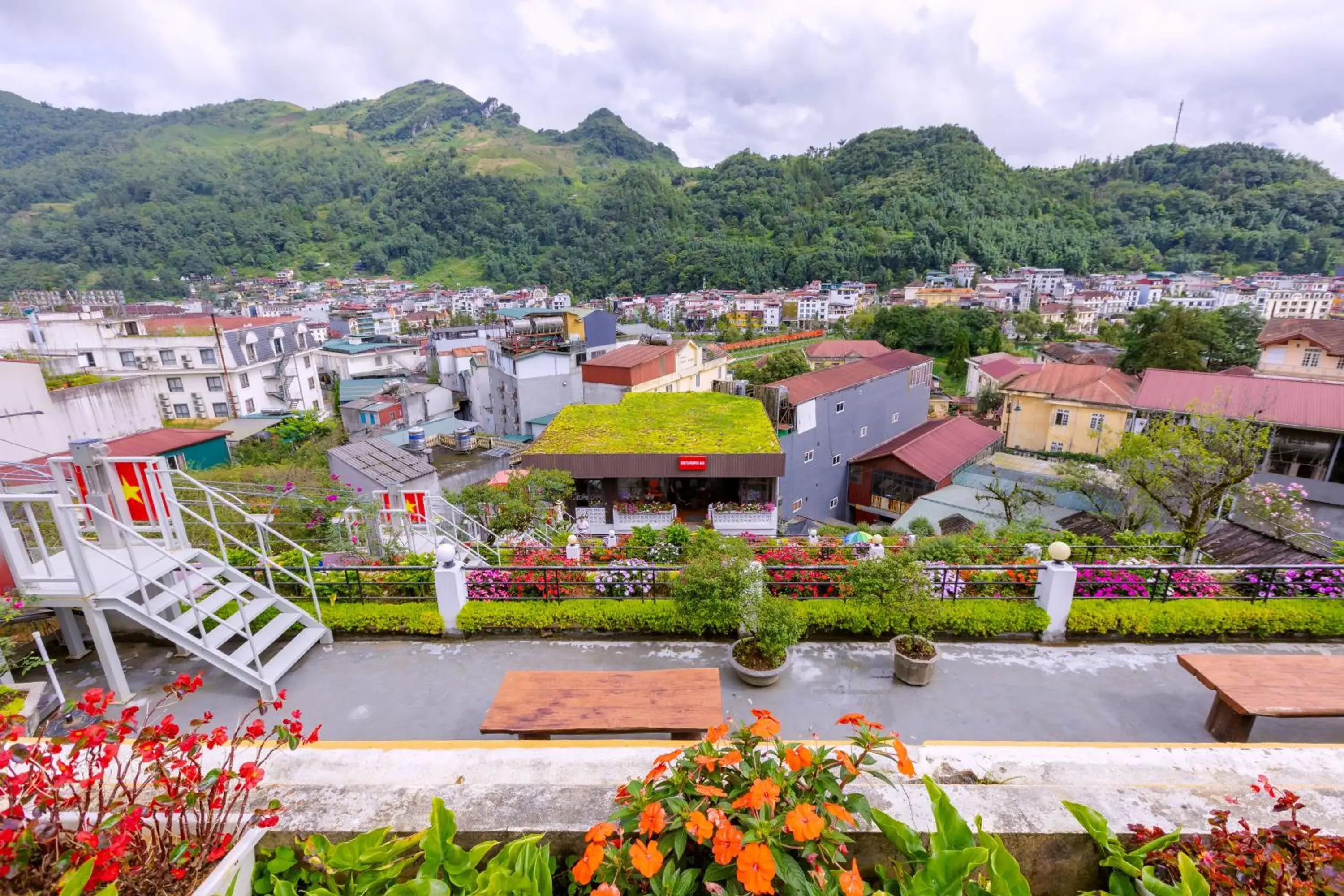 Deluxe Double Panoramic City View with Terrace in Sapa Village Hotel Deluxe Double Panoramic City View with Terrace in Sapa Village Hotel