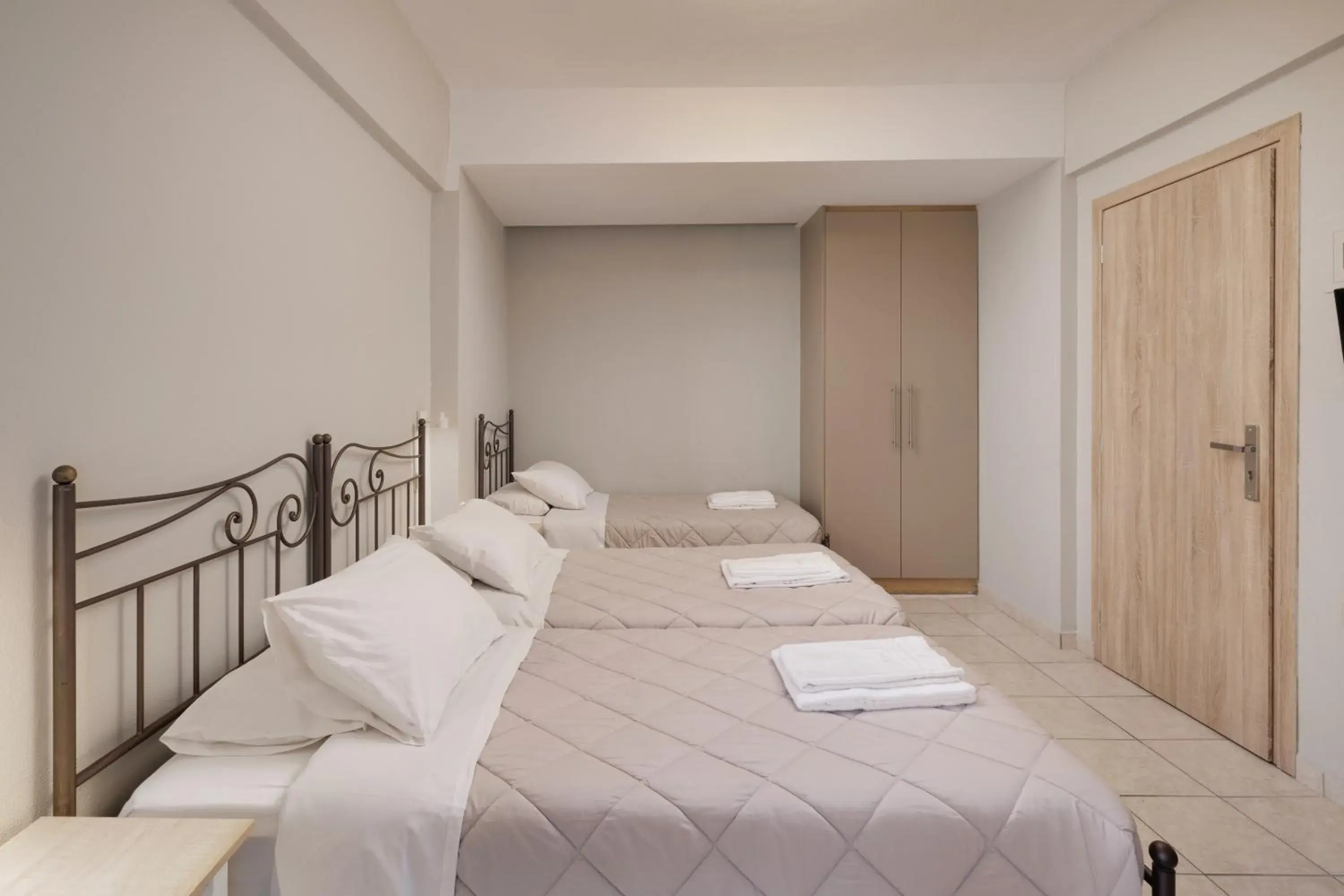 Comfort Triple Room in Louvre Hotel Comfort Triple Room in Louvre Hotel