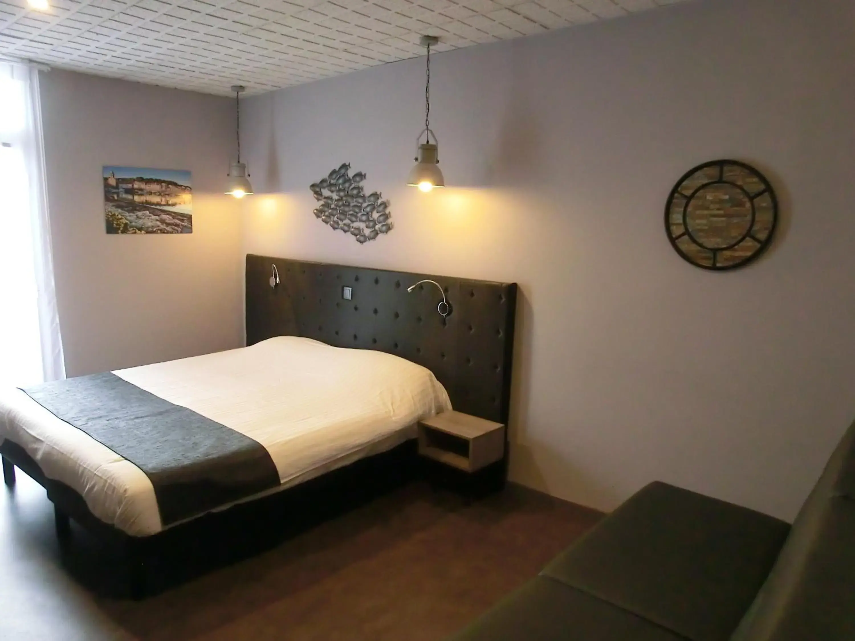 Quadruple Room with Sea View in Hotel Sur Le Quai Quadruple Room with Sea View in Hotel Sur Le Quai