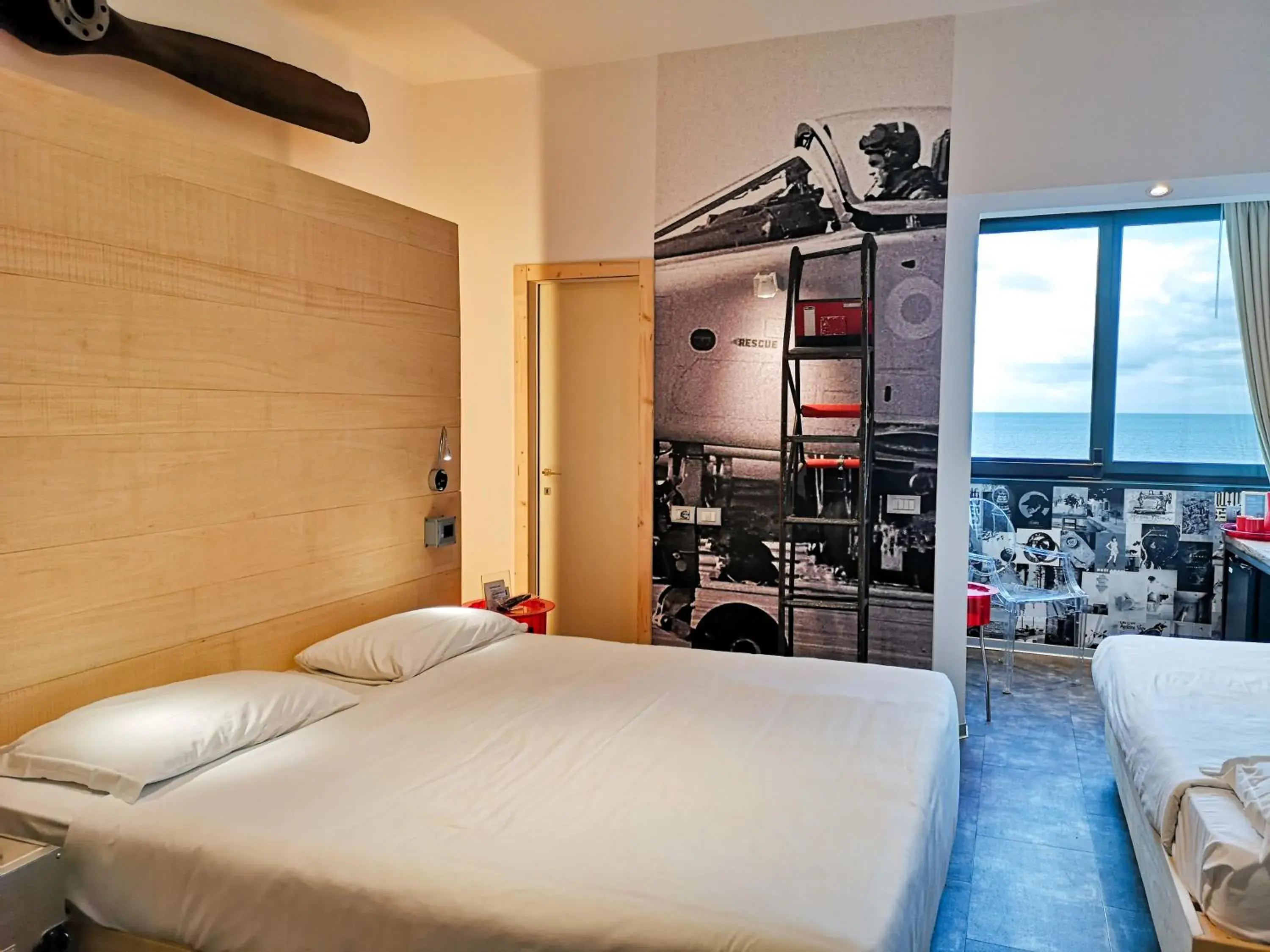 Quadruple Room in Hotel Perla - The storyhoteller Quadruple Room in Hotel Perla - The storyhoteller
