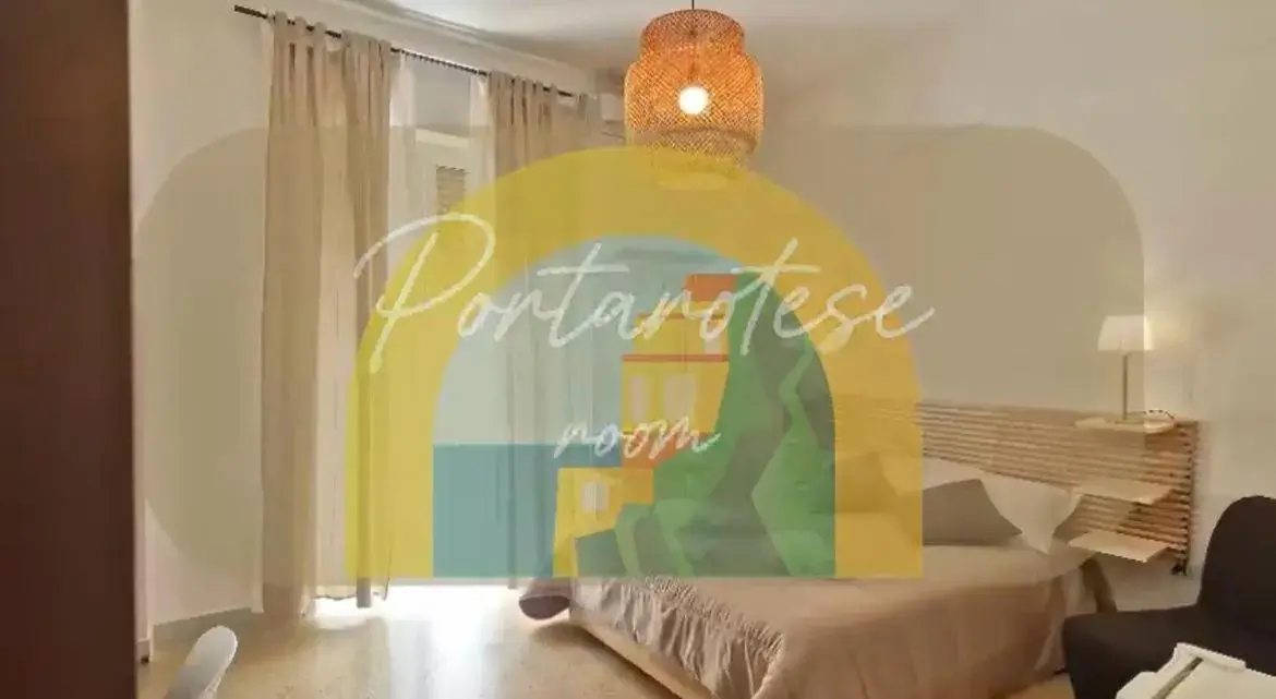 Triple Room with Balcony in Rooms hub Portarotese Triple Room with Balcony in Rooms hub Portarotese