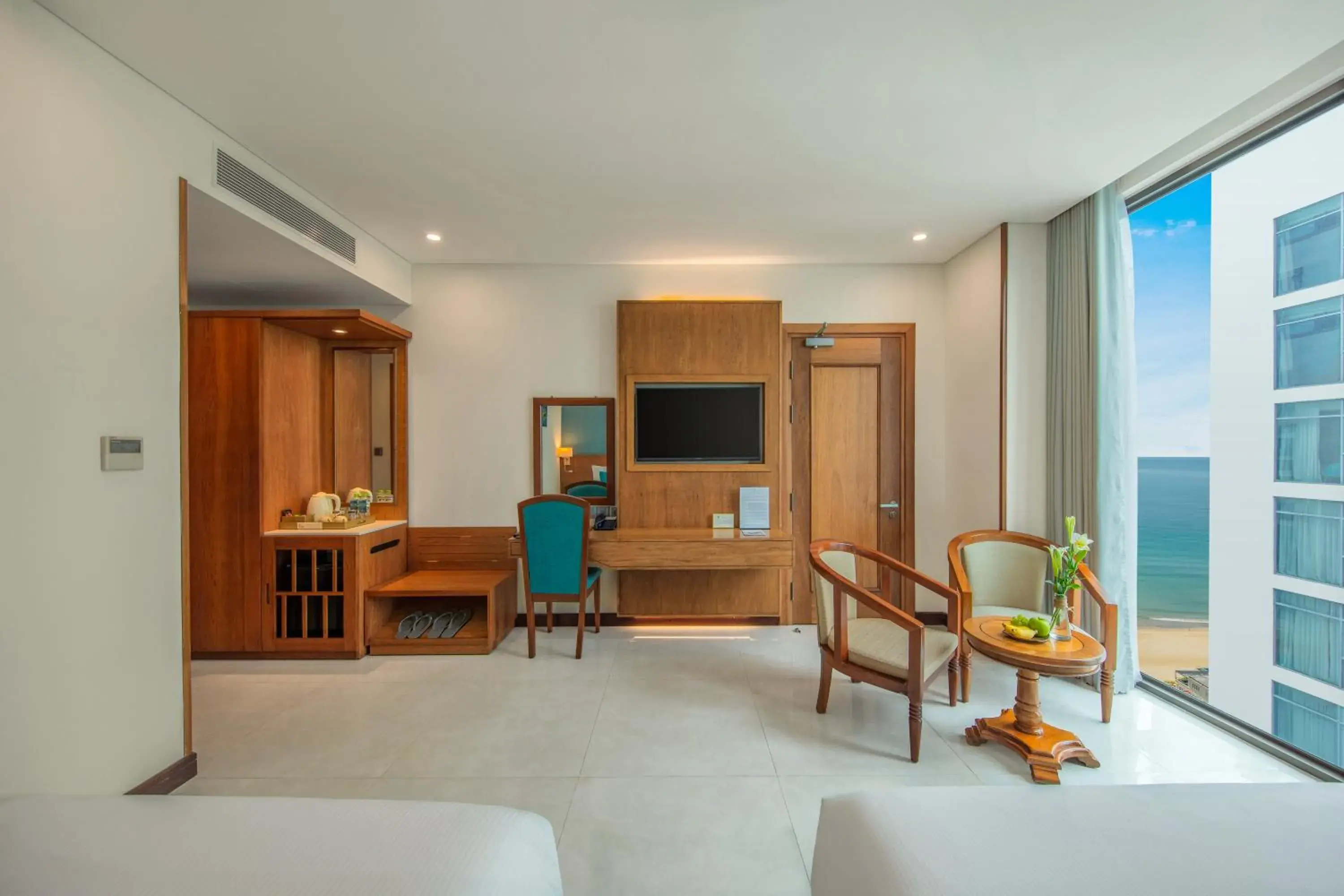 Family Room with Side Sea View in Mandila Beach Hotel Danang Family Room with Side Sea View in Mandila Beach Hotel Danang