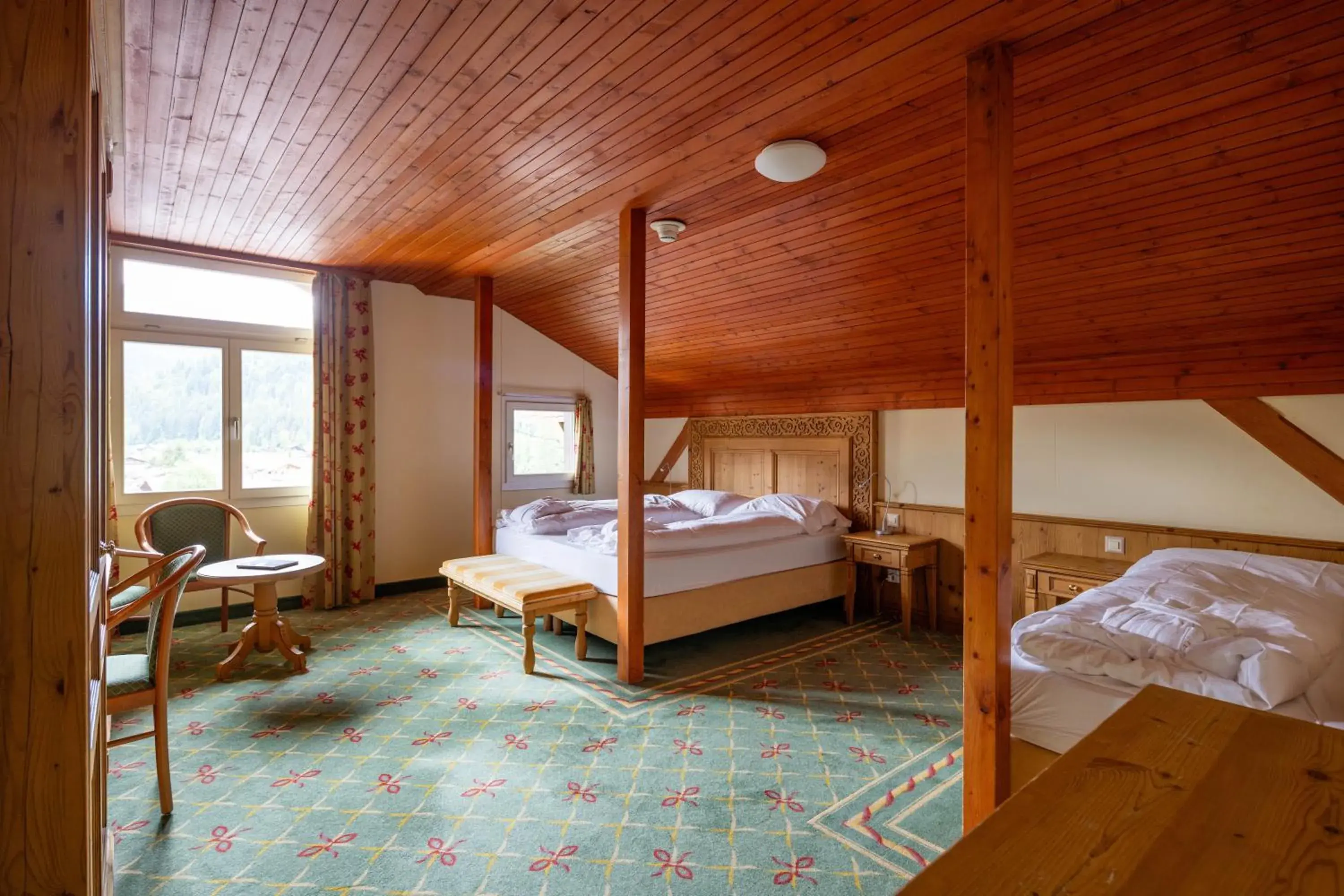 Triple Room in Sporthotel Wildstrubel Triple Room in Sporthotel Wildstrubel