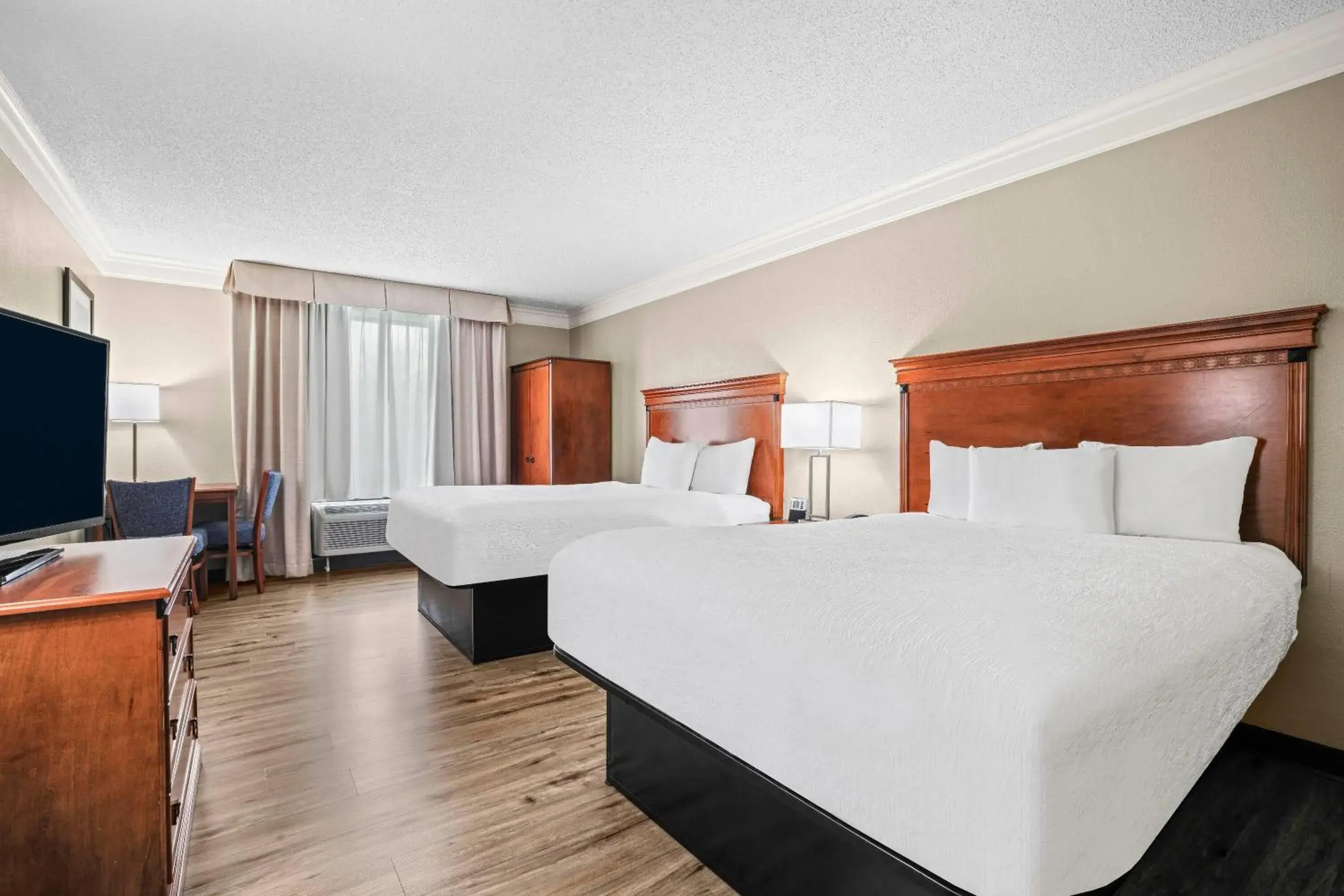 Queen Room with Two Queen Beds - Non-Smoking in Baymont by Wyndham Madisonville Queen Room with Two Queen Beds - Non-Smoking in Baymont by Wyndham Madisonville