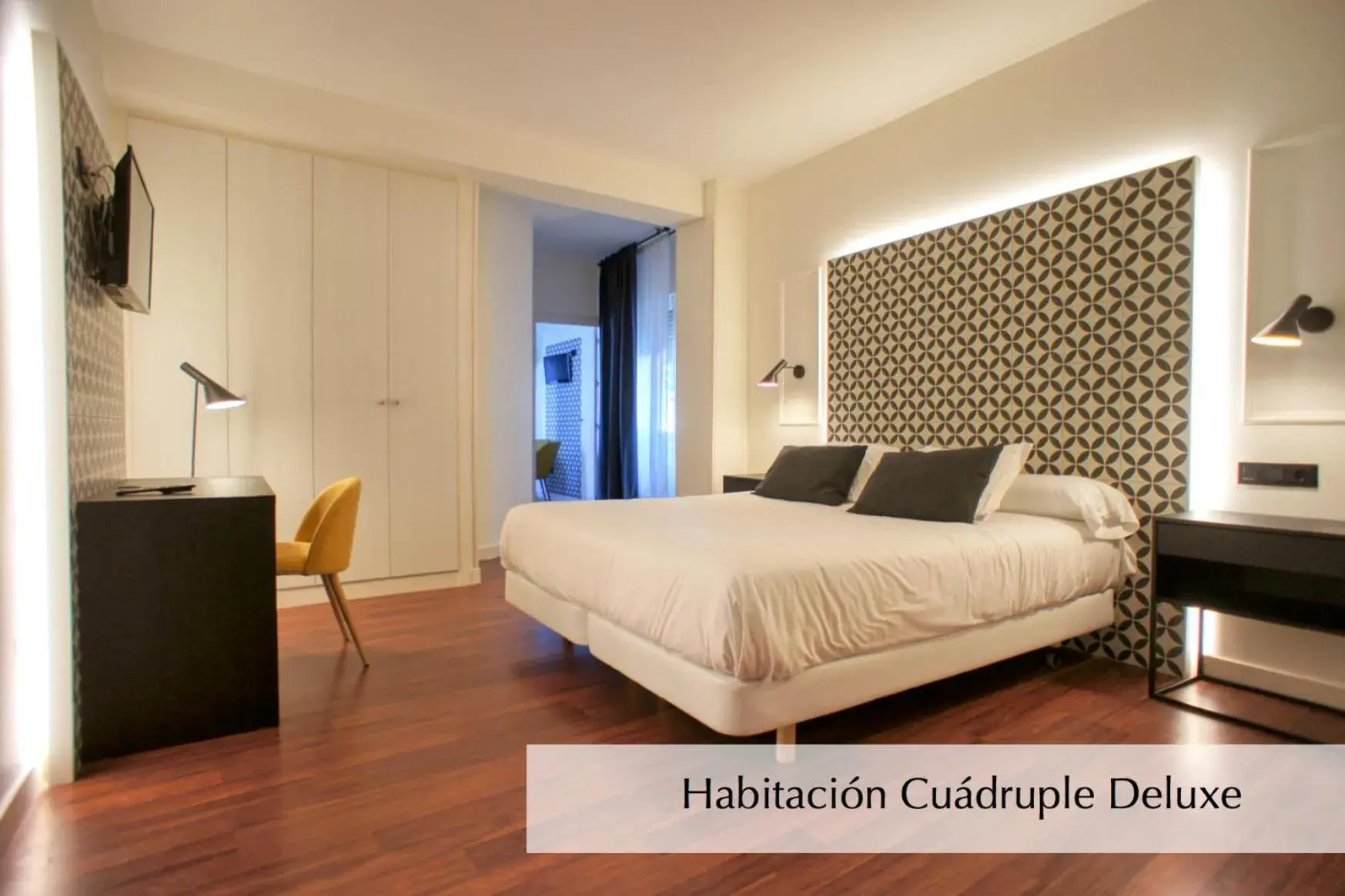 Deluxe Quadruple Room in Hotel Montermoso Deluxe Quadruple Room in Hotel Montermoso