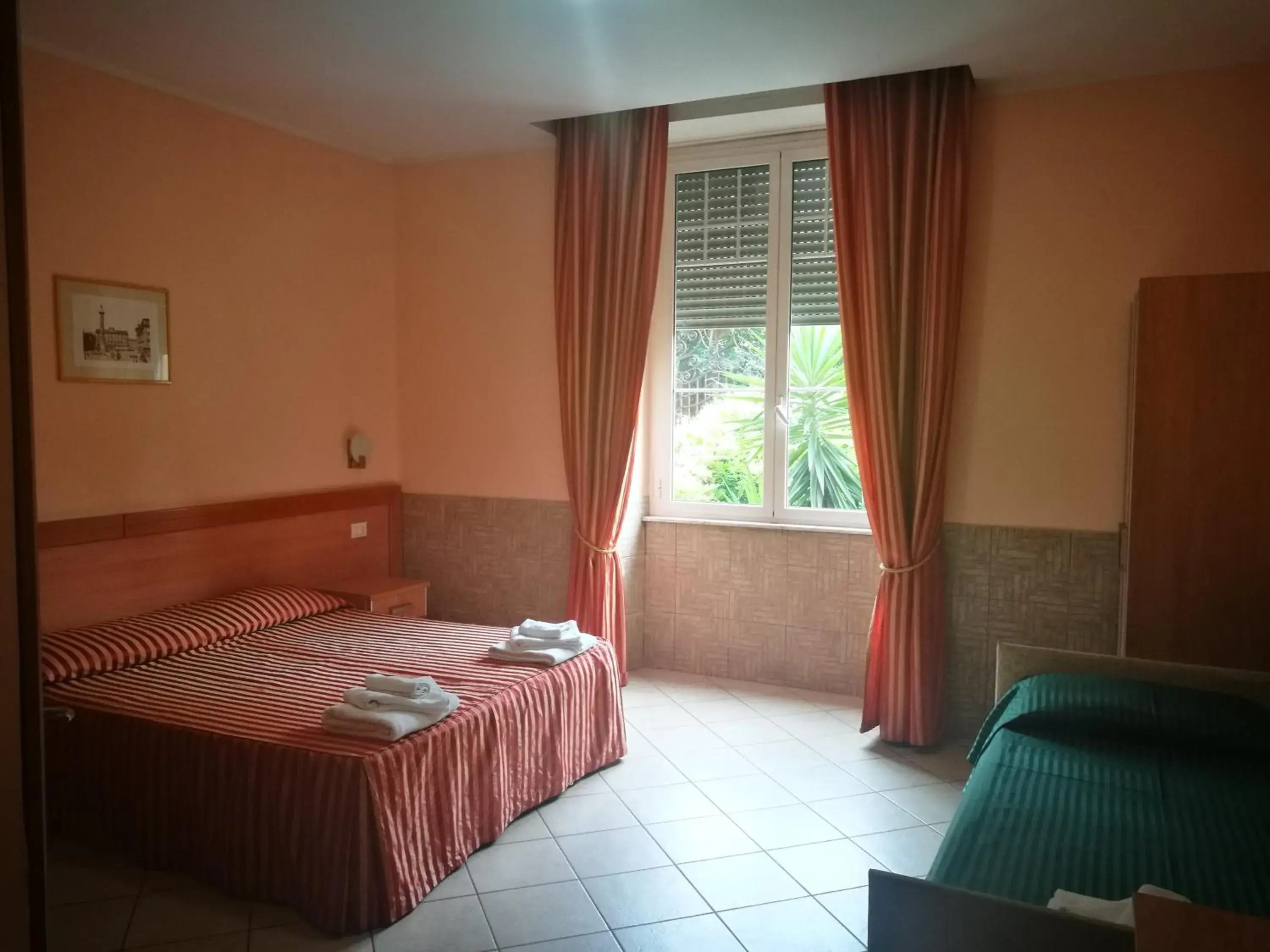 Triple Room in Palma Residences In Rome Triple Room in Palma Residences In Rome