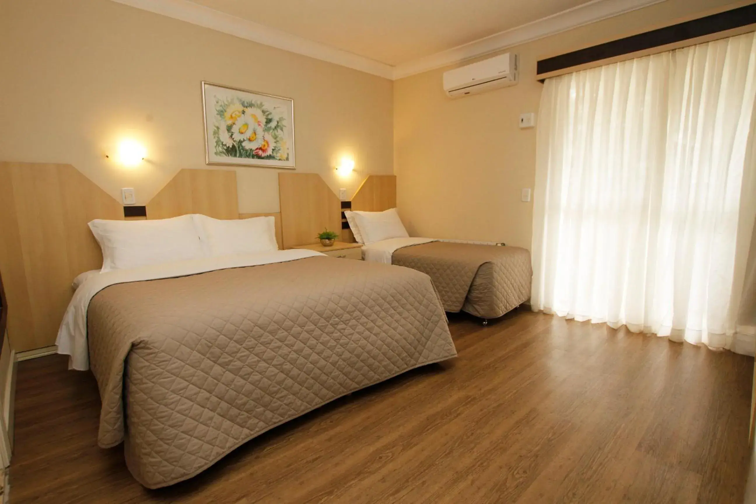 Deluxe Triple Room in Sky Ville Hotel Canela Deluxe Triple Room in Sky Ville Hotel Canela