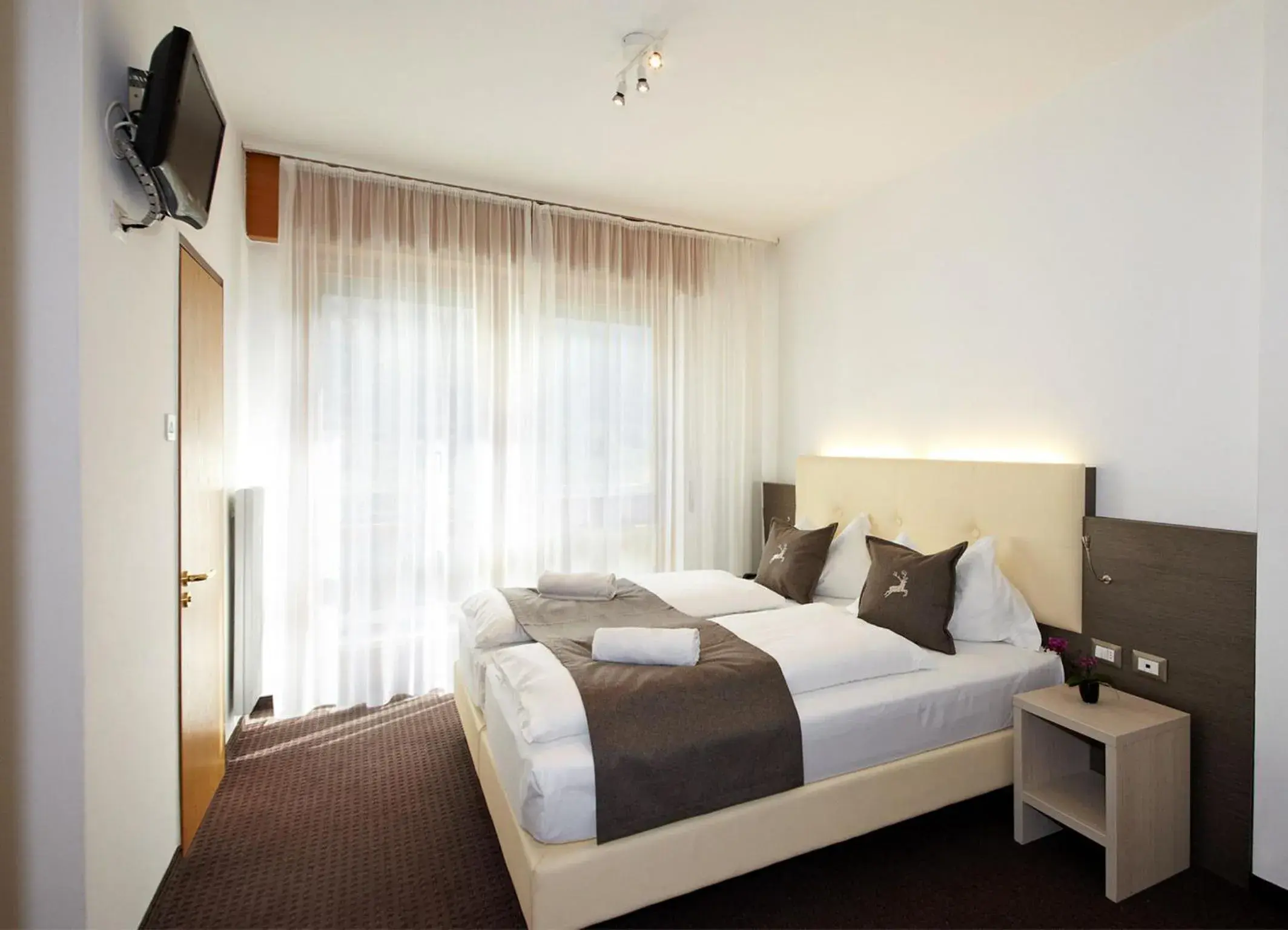 Triple Room with Balcony - Street Side in Hotel Raffl Triple Room with Balcony - Street Side in Hotel Raffl