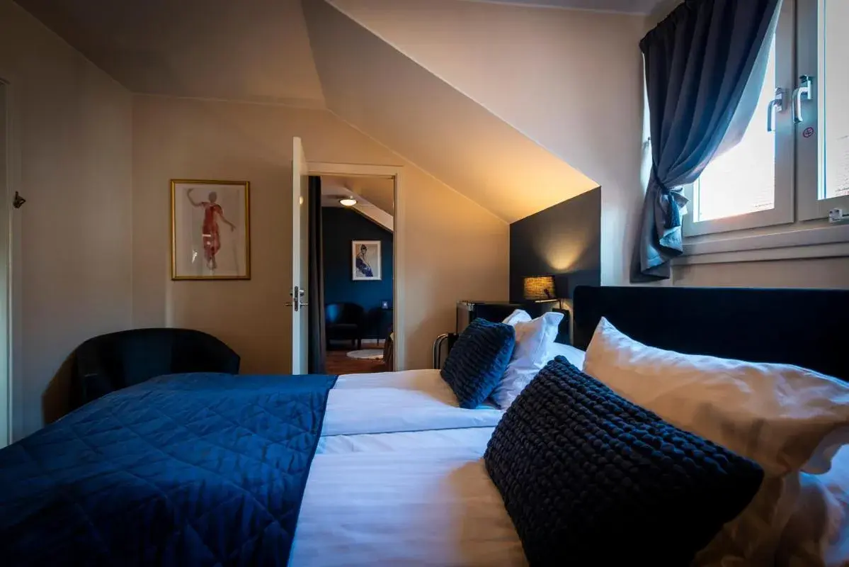 Quadruple Room in Hotell Aqva Restaurang & Bar Ett Biosfärhotell med fokus på hållbarhet Quadruple Room in Hotell Aqva Restaurang & Bar Ett Biosfärhotell med fokus på hållbarhet