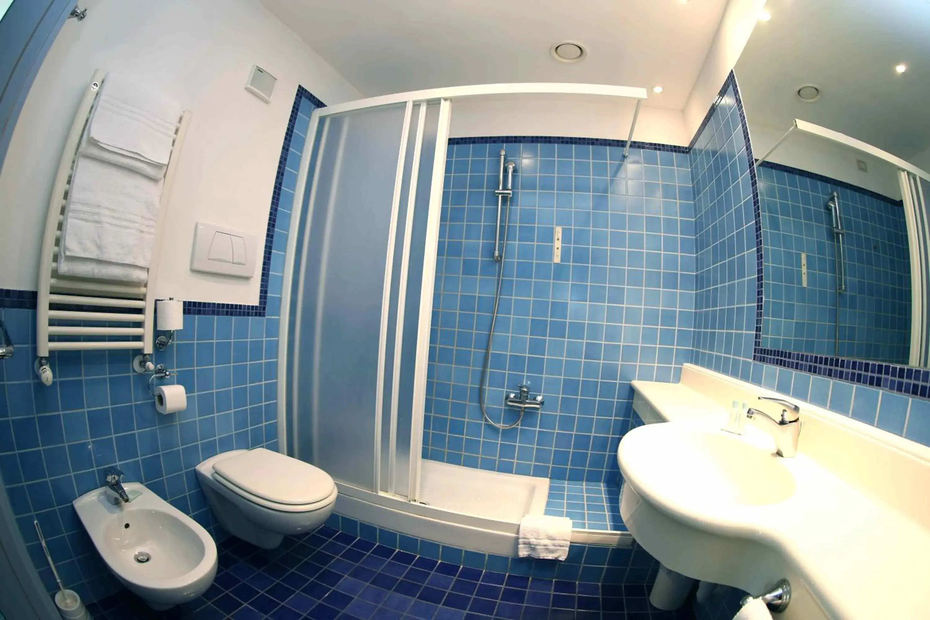 Superior Quadruple Room in Hotel Express Aosta East Superior Quadruple Room in Hotel Express Aosta East