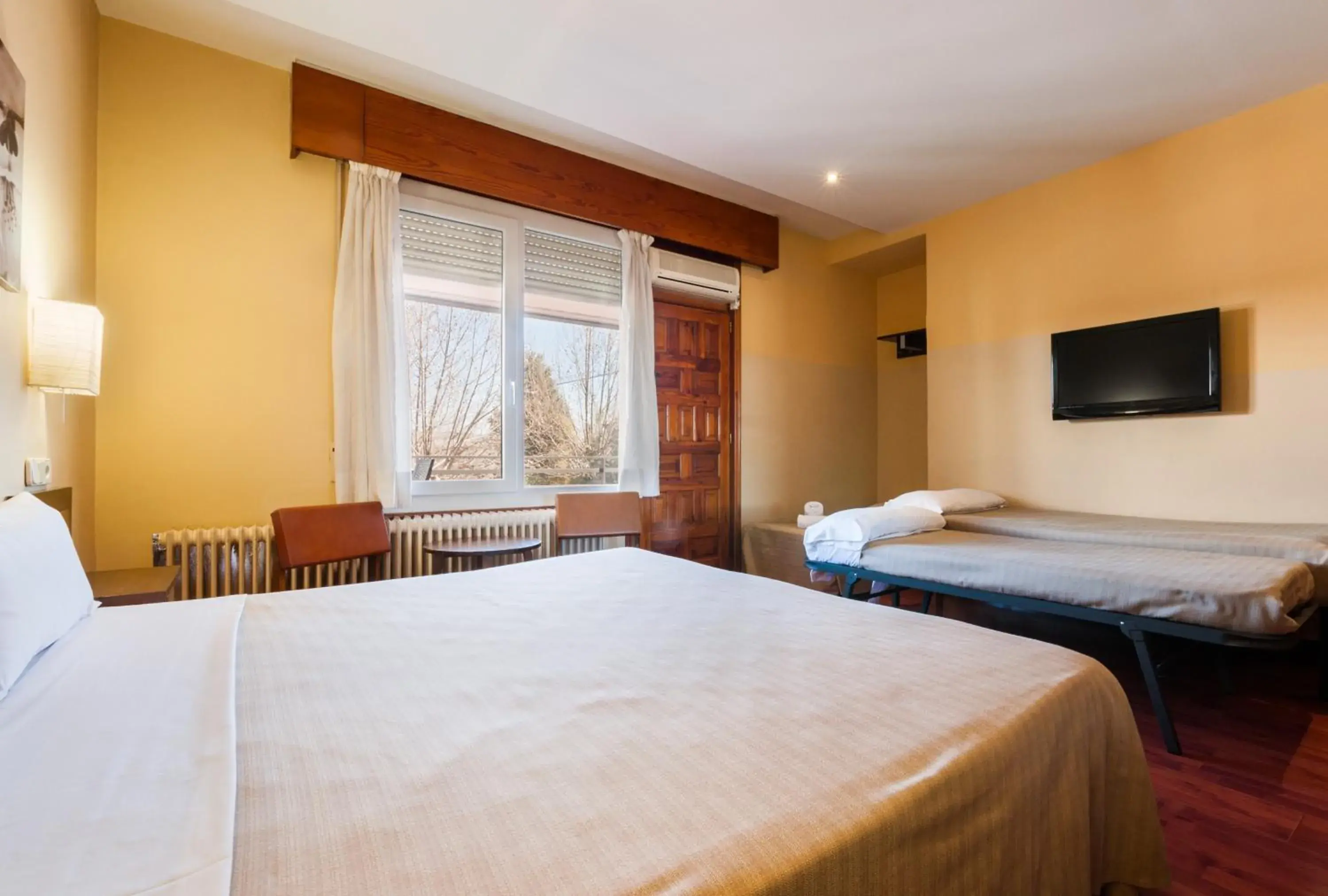 Quadruple Room (2 Adults + 2 Children) in Hotel Los Olivos Quadruple Room (2 Adults + 2 Children) in Hotel Los Olivos