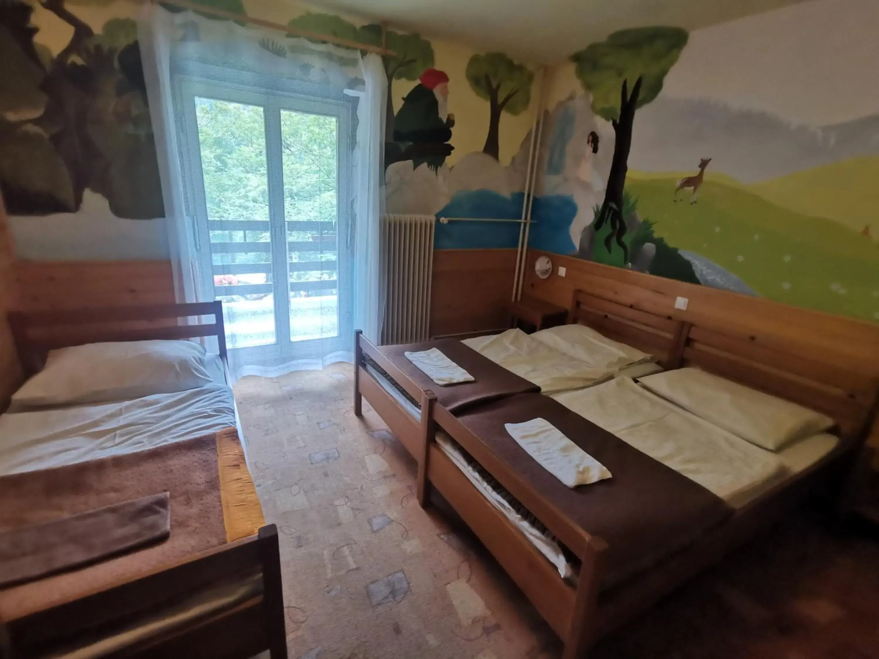 Triple Room with Private Bathroom in Hostel pod Voglom Triple Room with Private Bathroom in Hostel pod Voglom